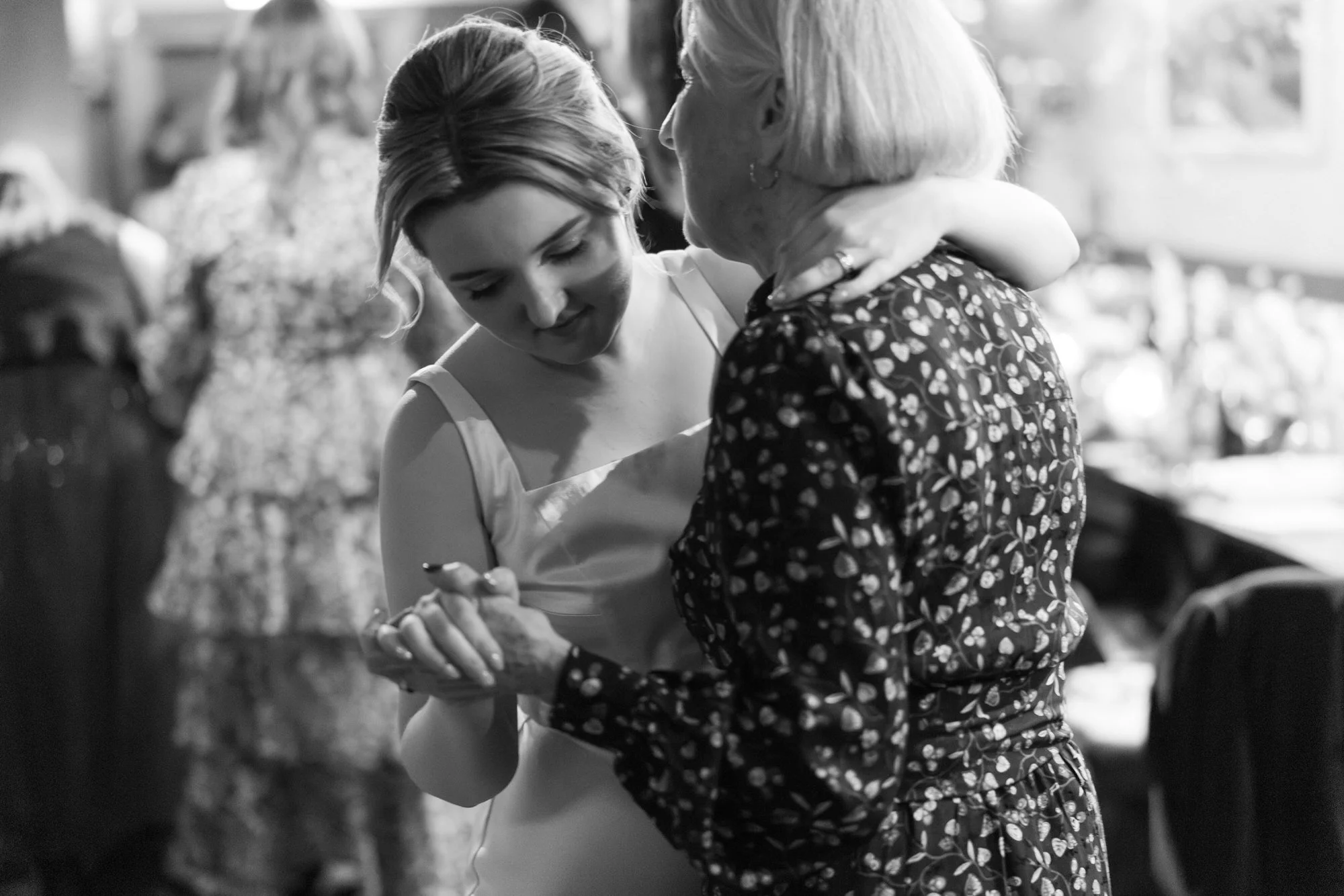 A warm, candid moment from Erin and Matthew’s Glasgow wedding evening
