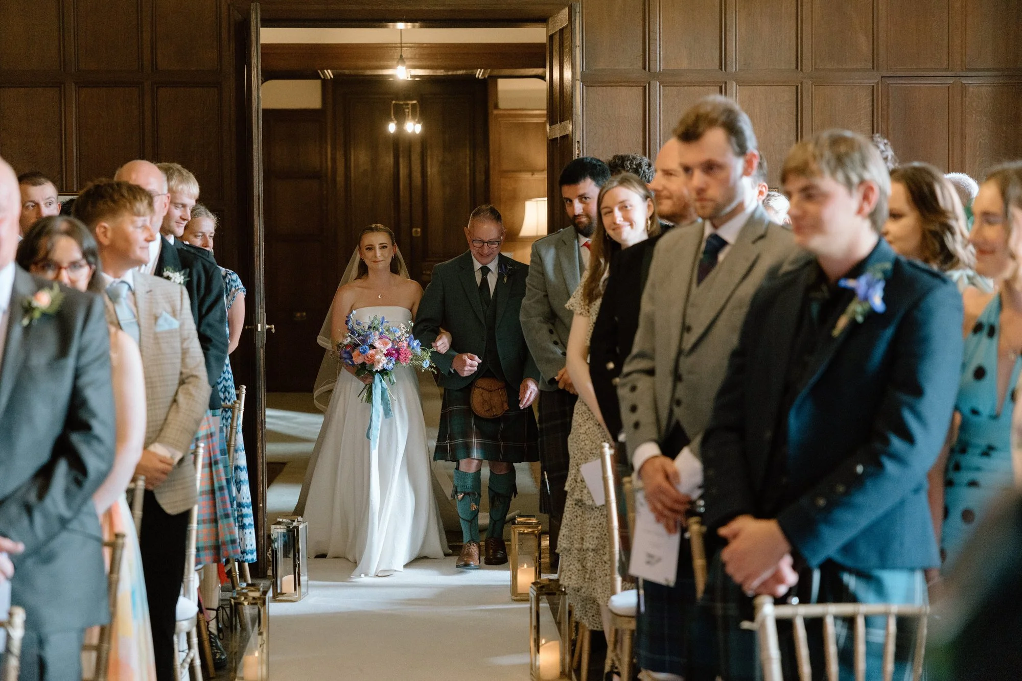 Candid ceremony moment at a Rowallan Castle wedding