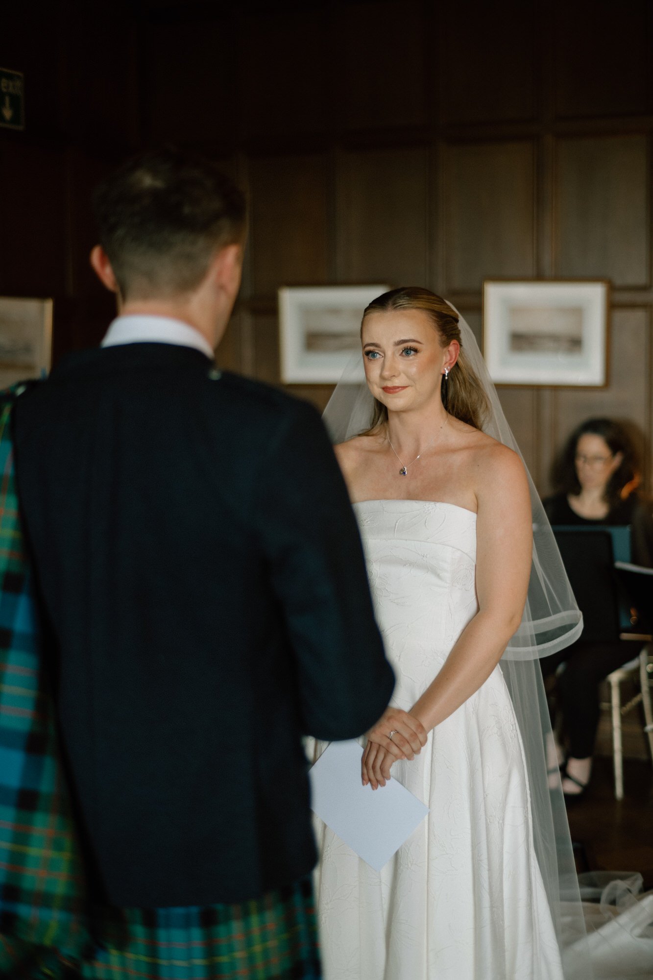 Iona and Lewis during their Rowallan Castle wedding ceremony