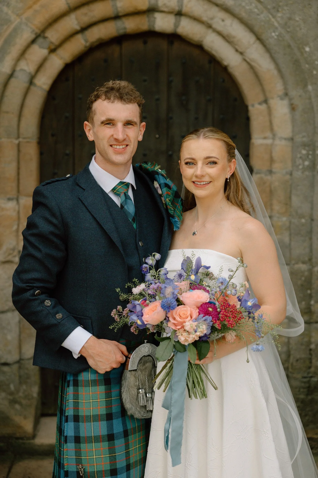 Relaxed couple portrait outside Rowallan Castle