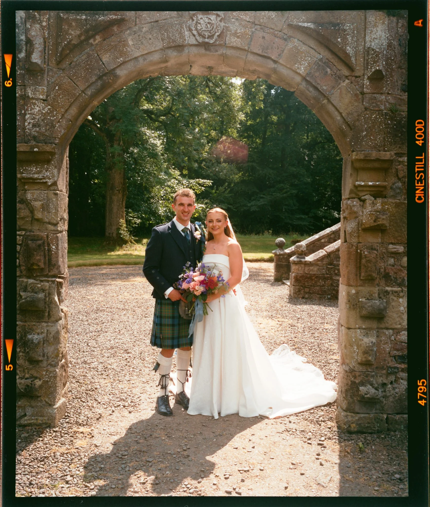 Iona and Lewis together after their Rowallan Castle ceremony