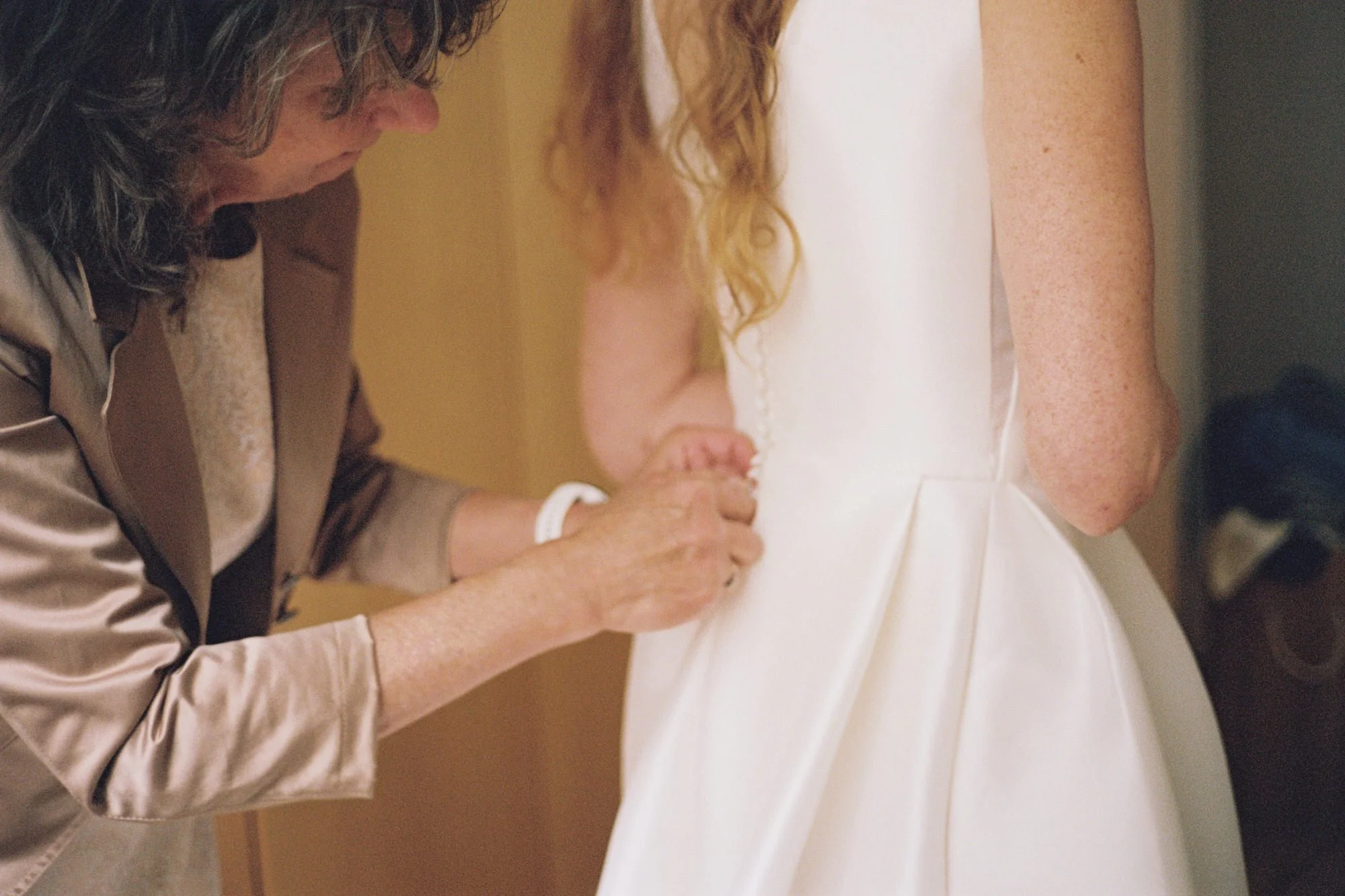 A quiet candid moment before the back-garden ceremony
