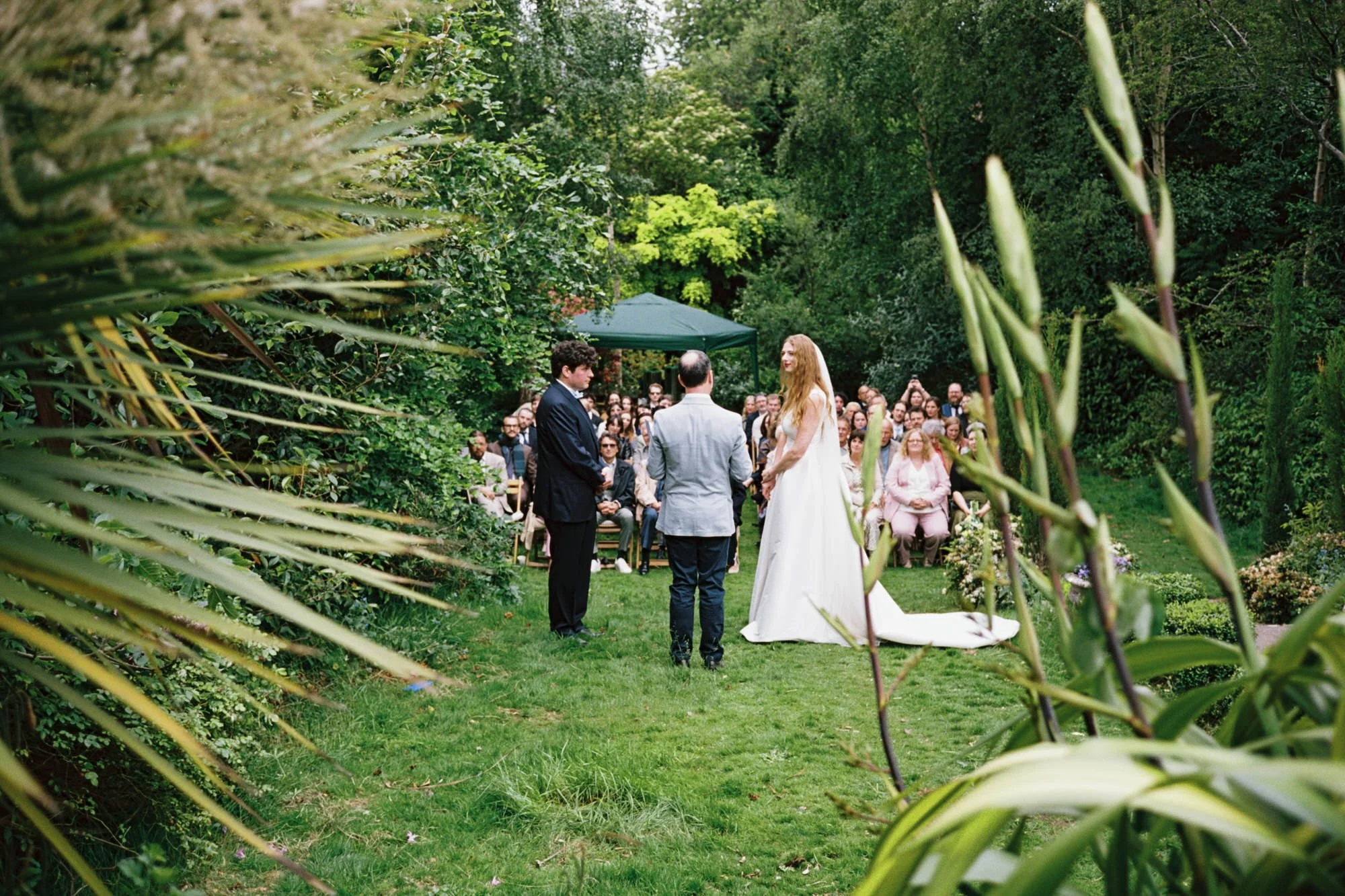 Outdoor wedding ceremony surrounded by greenery in Morningside