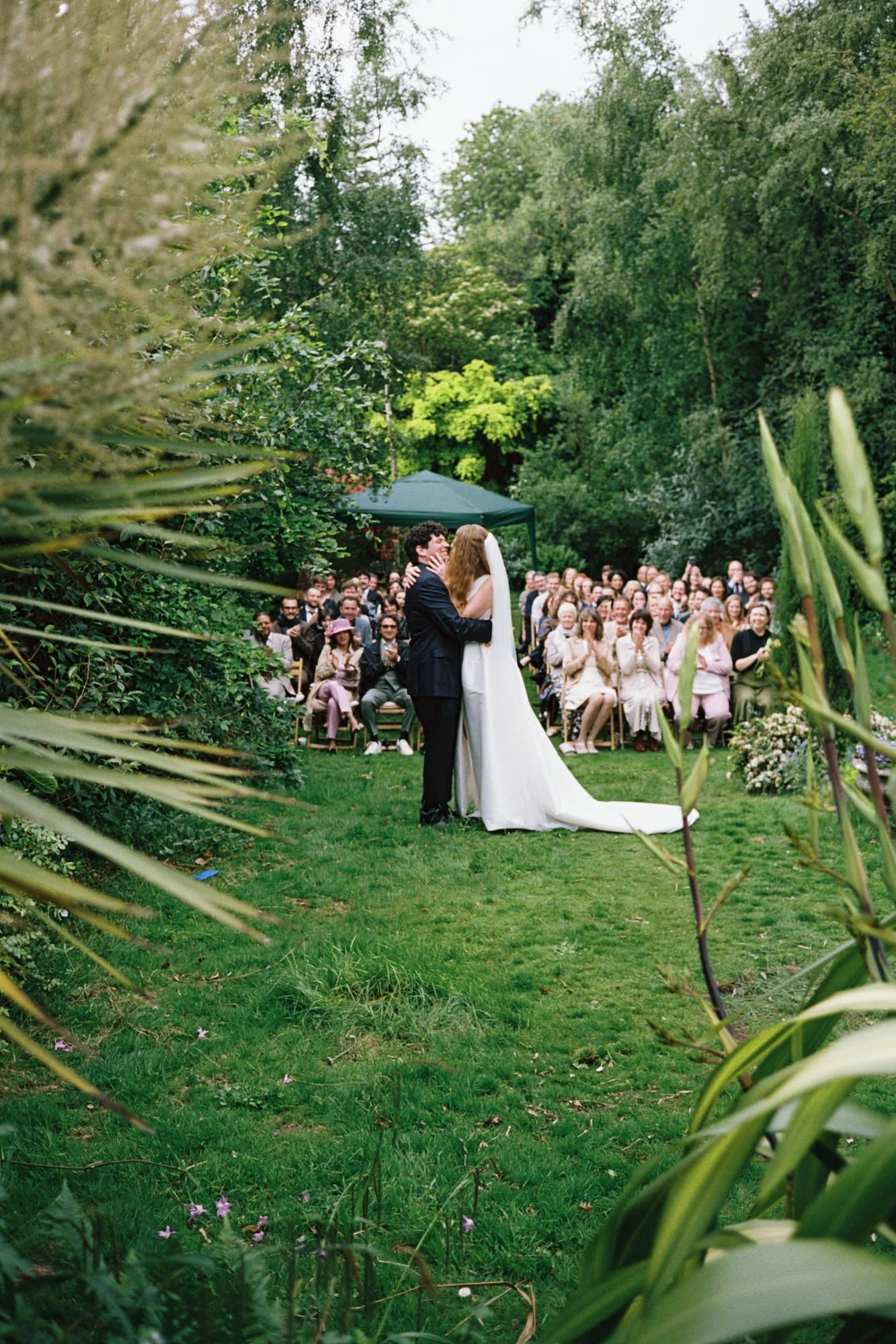 Alessandro and Mara exchanging vows in their Morningside back garden