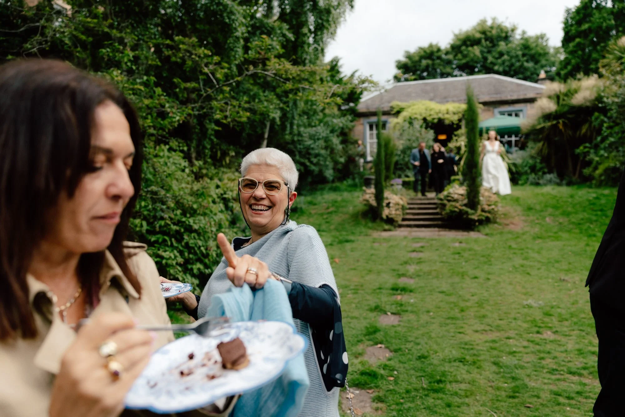 Friends celebrating together at a back-garden wedding in Edinburgh