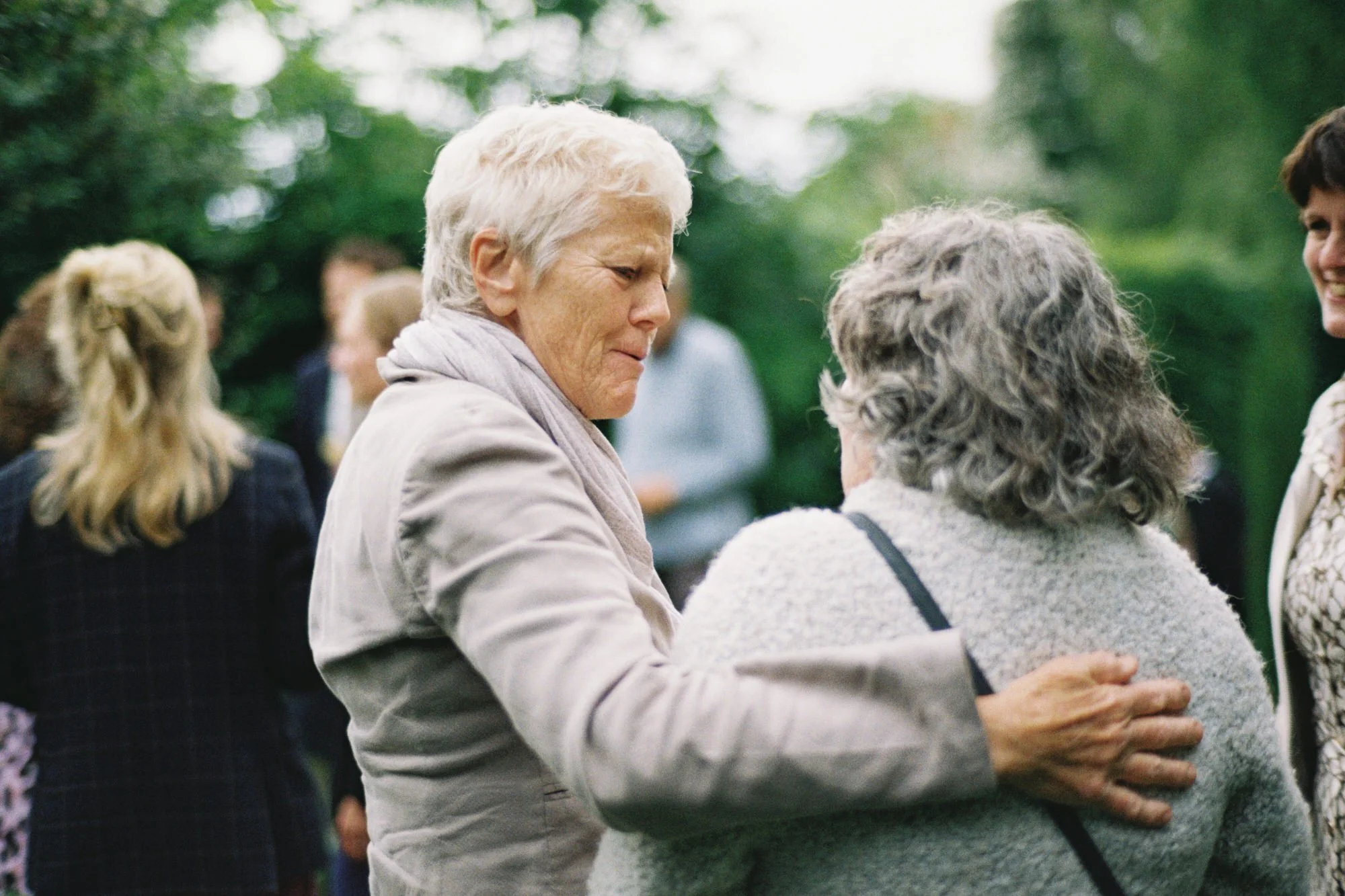 Friends and family photographed on film during the garden celebration