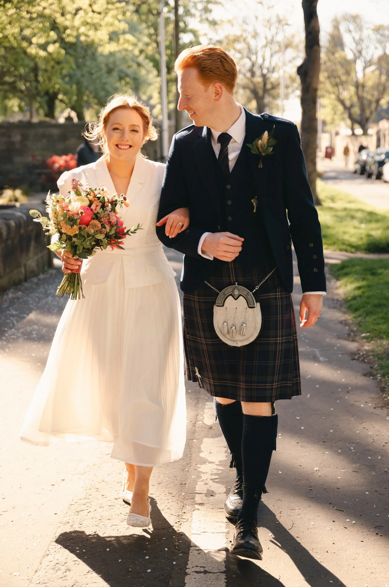 Documentary wedding photograph by the St Andrews coast