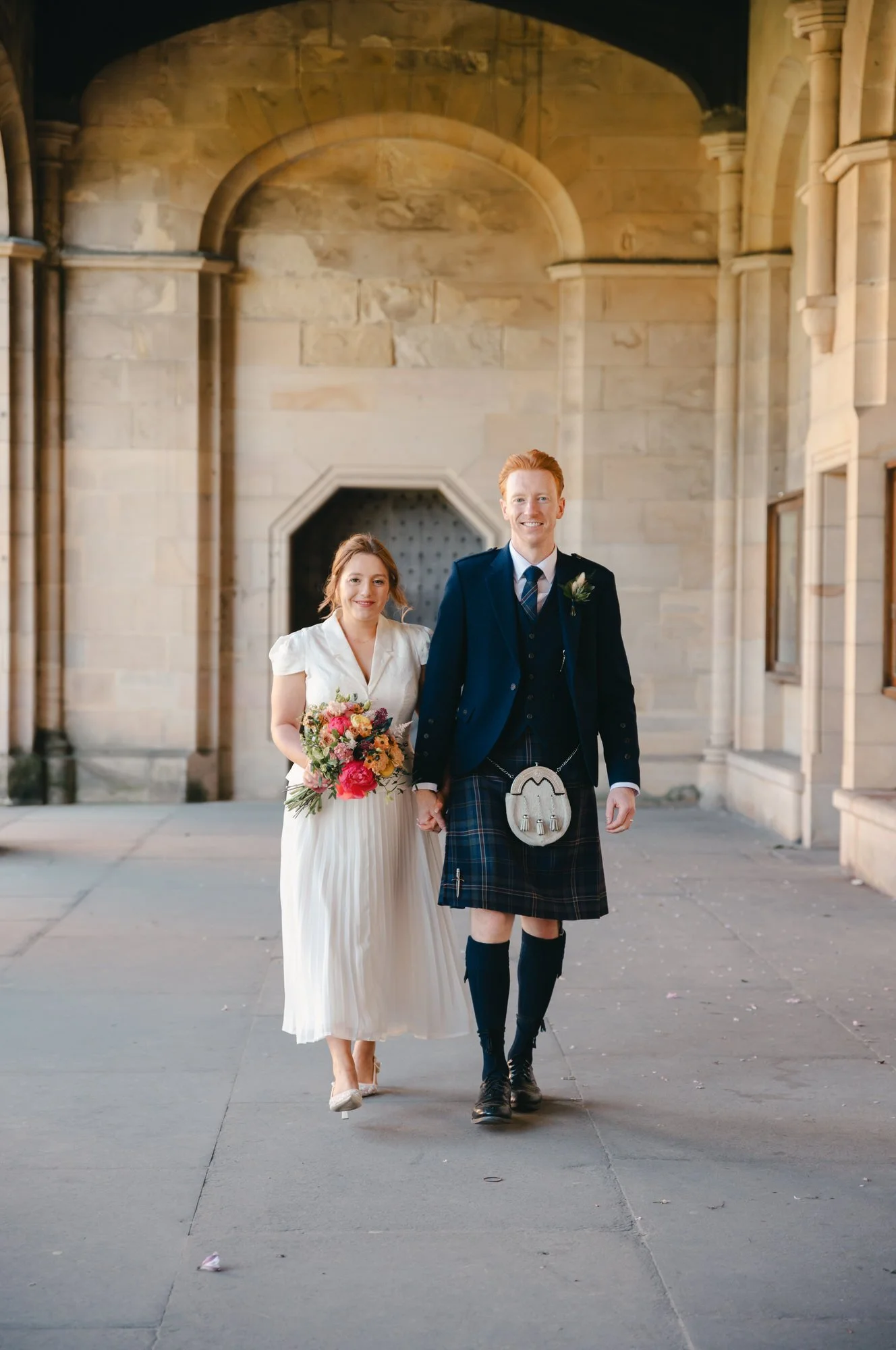 Hazel and Ally together after their intimate St Andrews ceremony