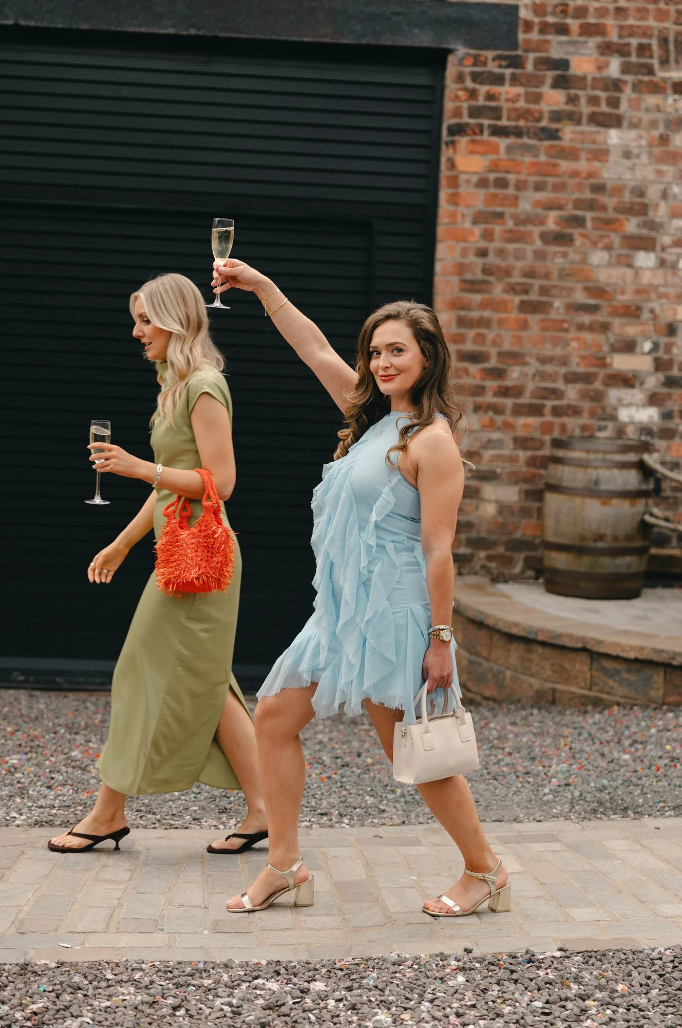Hazel and Ally greeting friends at their Glasgow wedding party