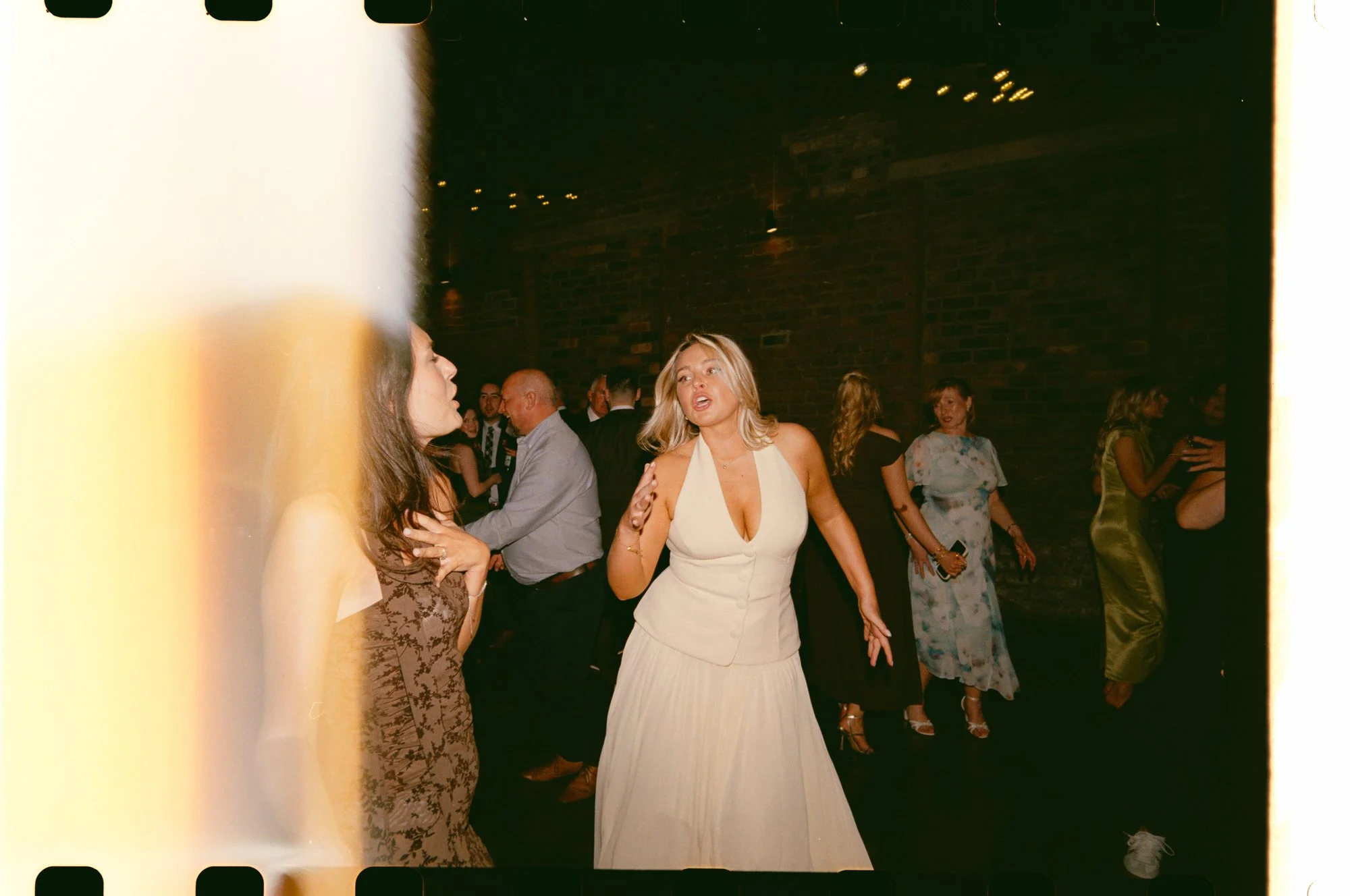 Wedding guests reacting to the speeches at The Engine Works Glasgow
