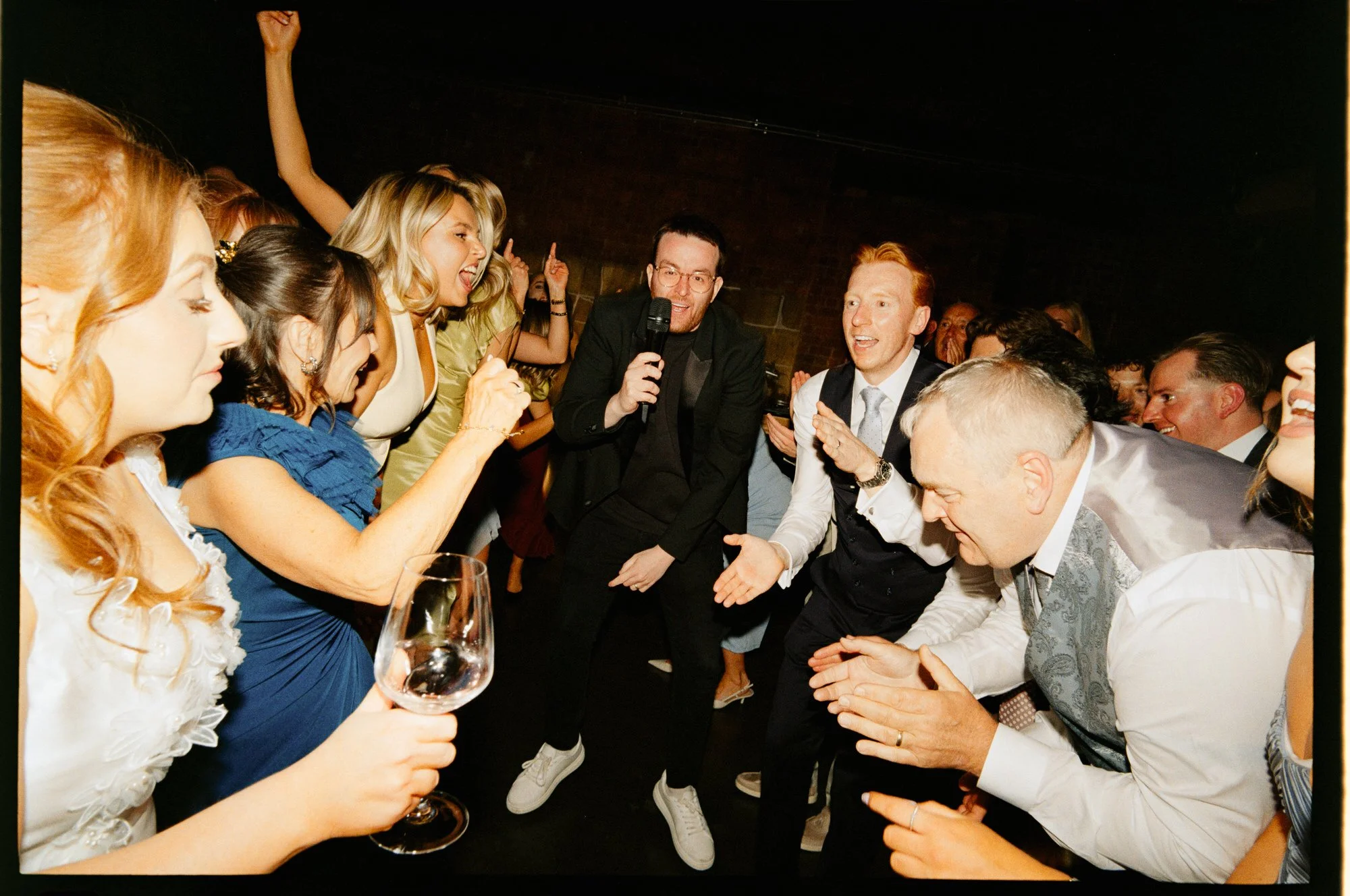 Energetic dance-floor photograph at The Engine Works wedding