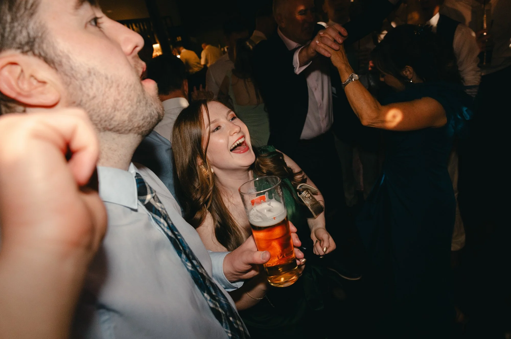 Joyful candid moment during Hazel and Ally’s Engine Works celebration