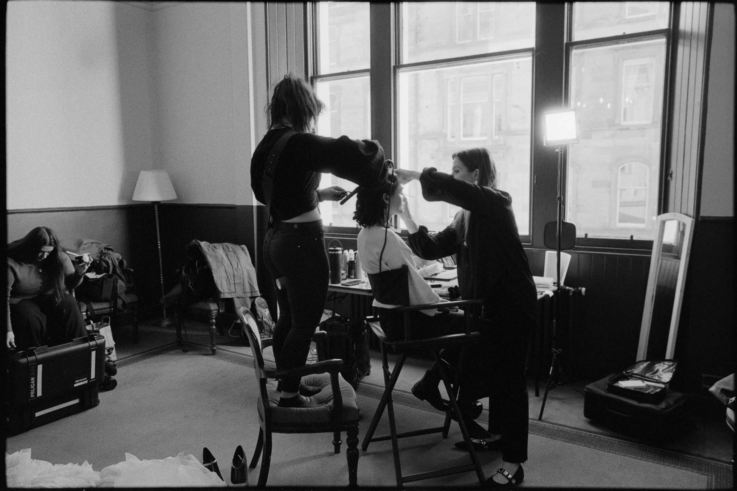 Behind the scenes hair and make-up preparation at an Edinburgh theatre photography workshop
