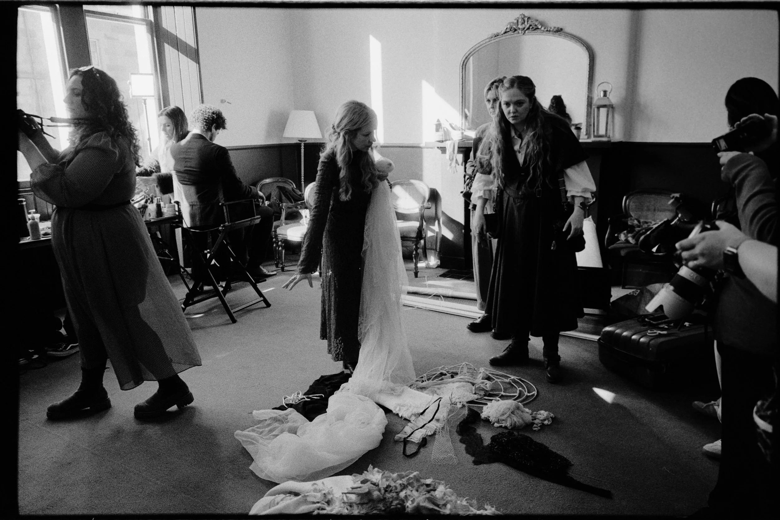 Photographers and performers preparing backstage at the Edinburgh creative workshop