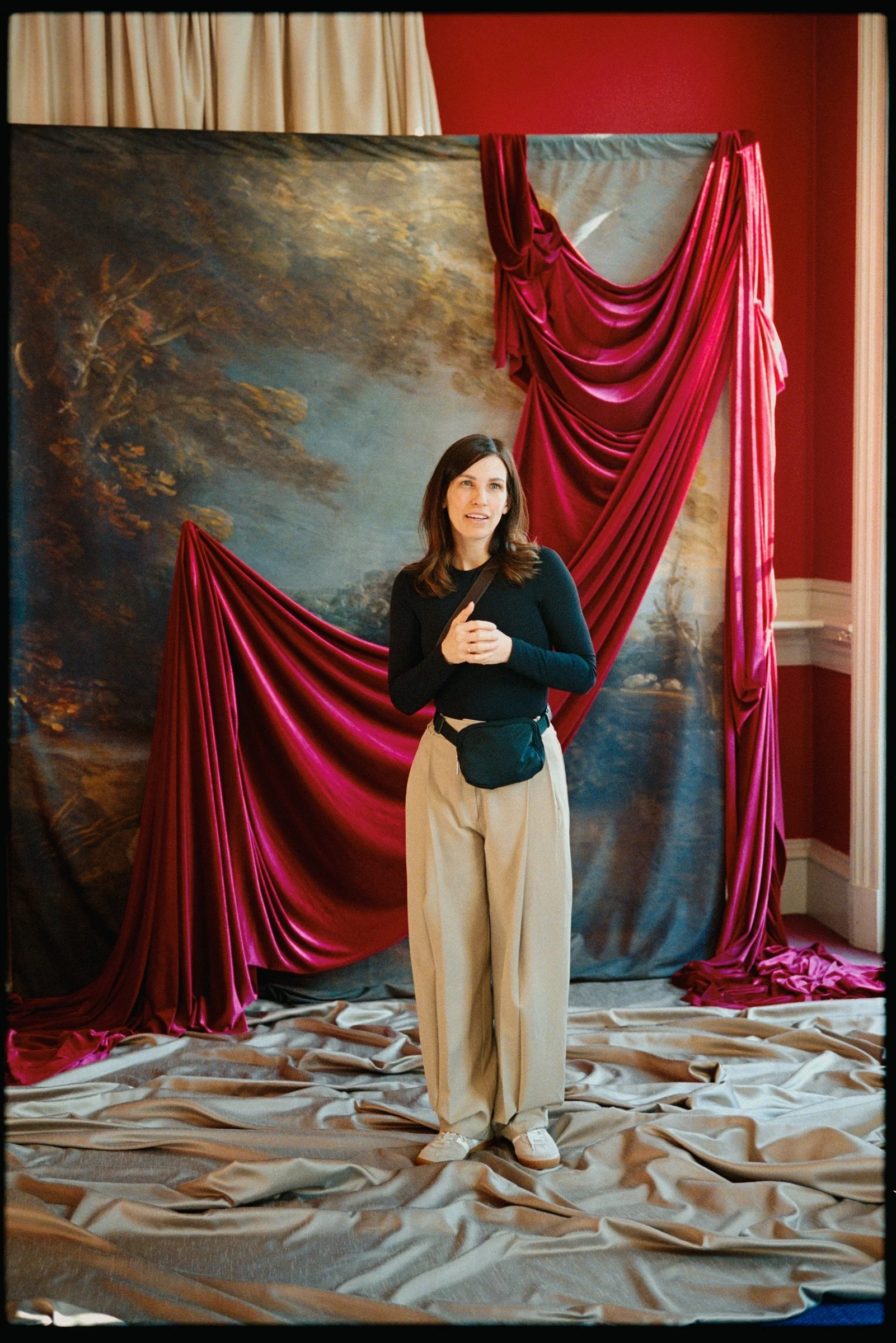 Creative direction taking place within the red-draped A Night at the Opera set