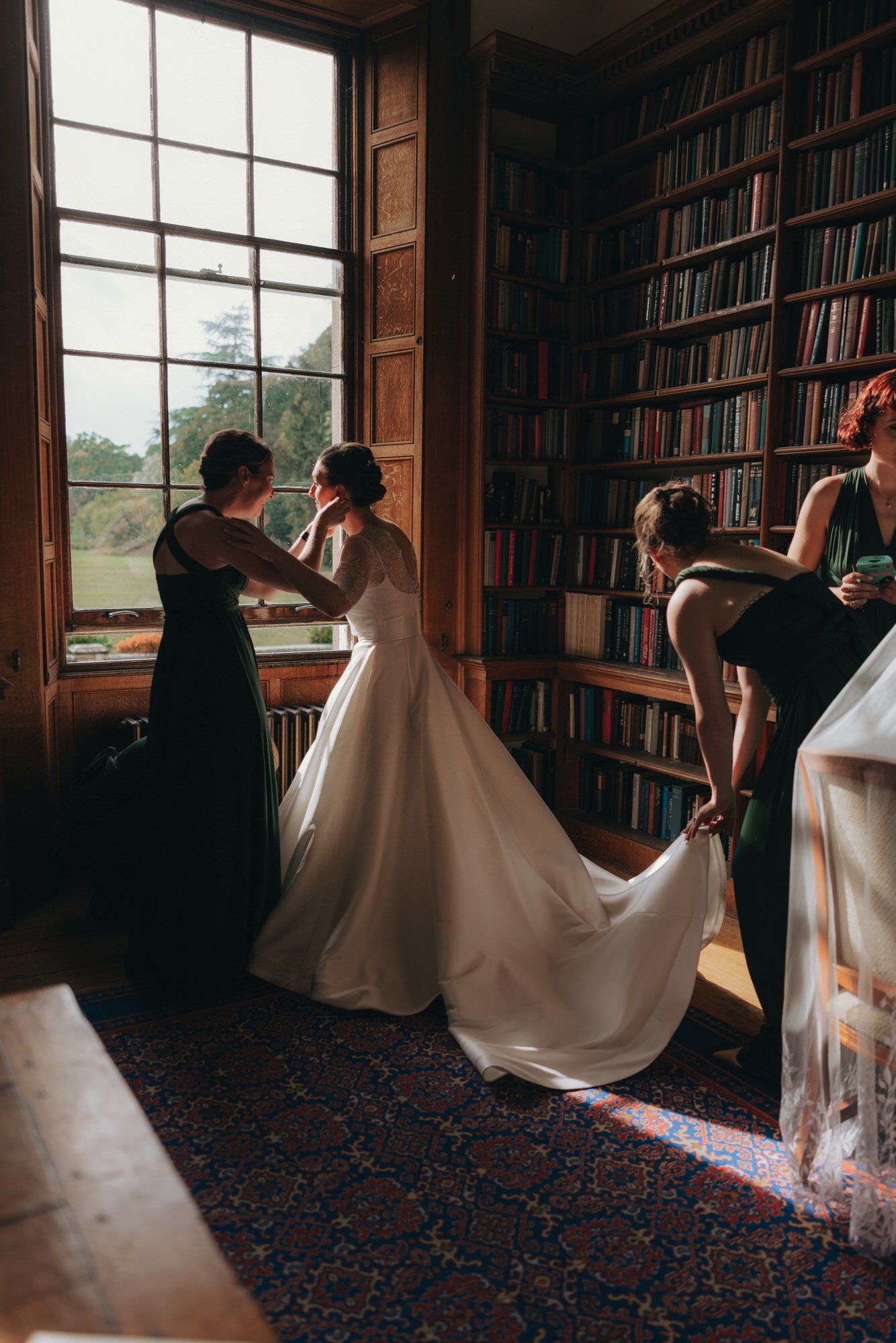 bridesmaids-during-carberry-tower-wedding-morning.jpg