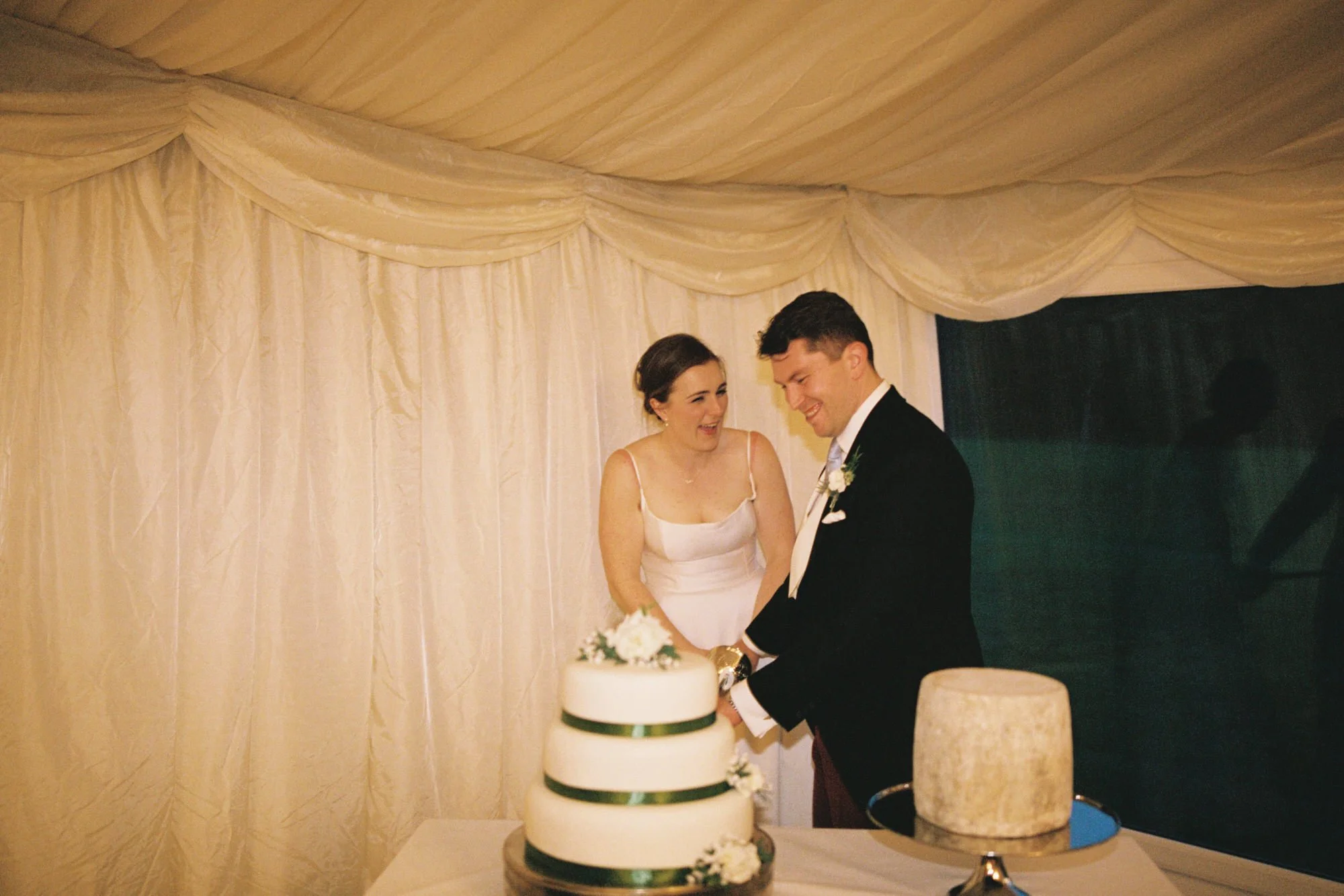 katy-and-will-cutting-their-wedding-cake.jpg
