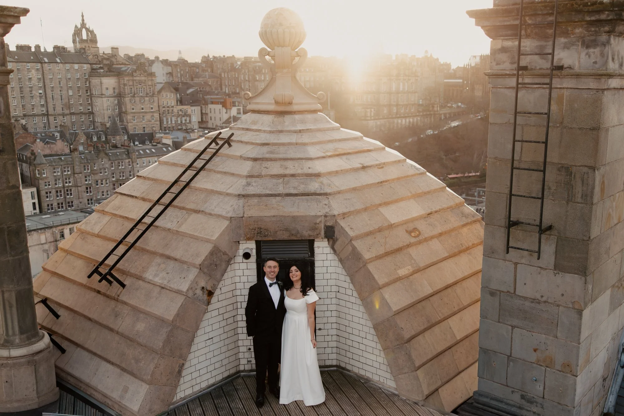 A wide rooftop portrait framed by the Balmoral’s stone architecture.
