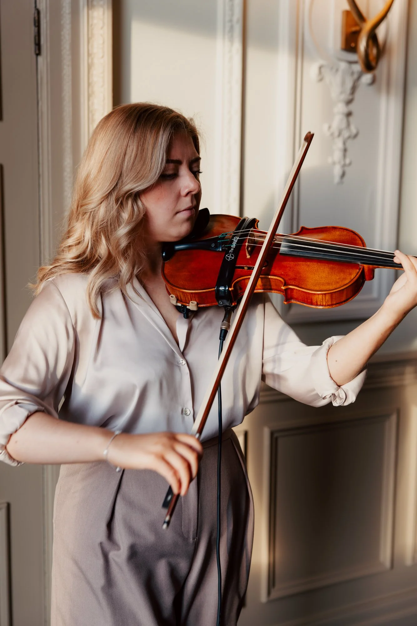 A violinist playing during the wedding at the Balmoral.