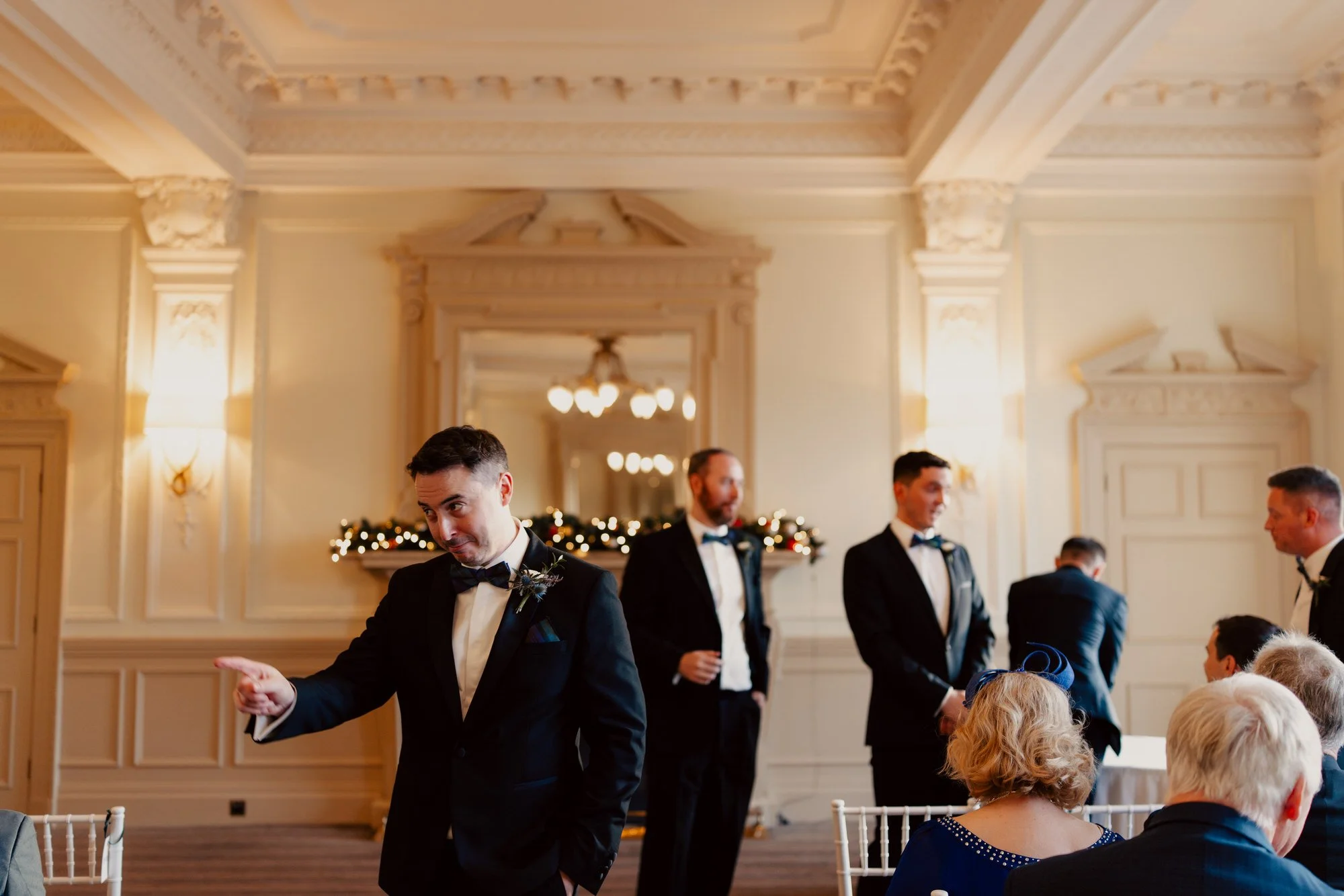 Vincent waiting in the cream-coloured ceremony room.