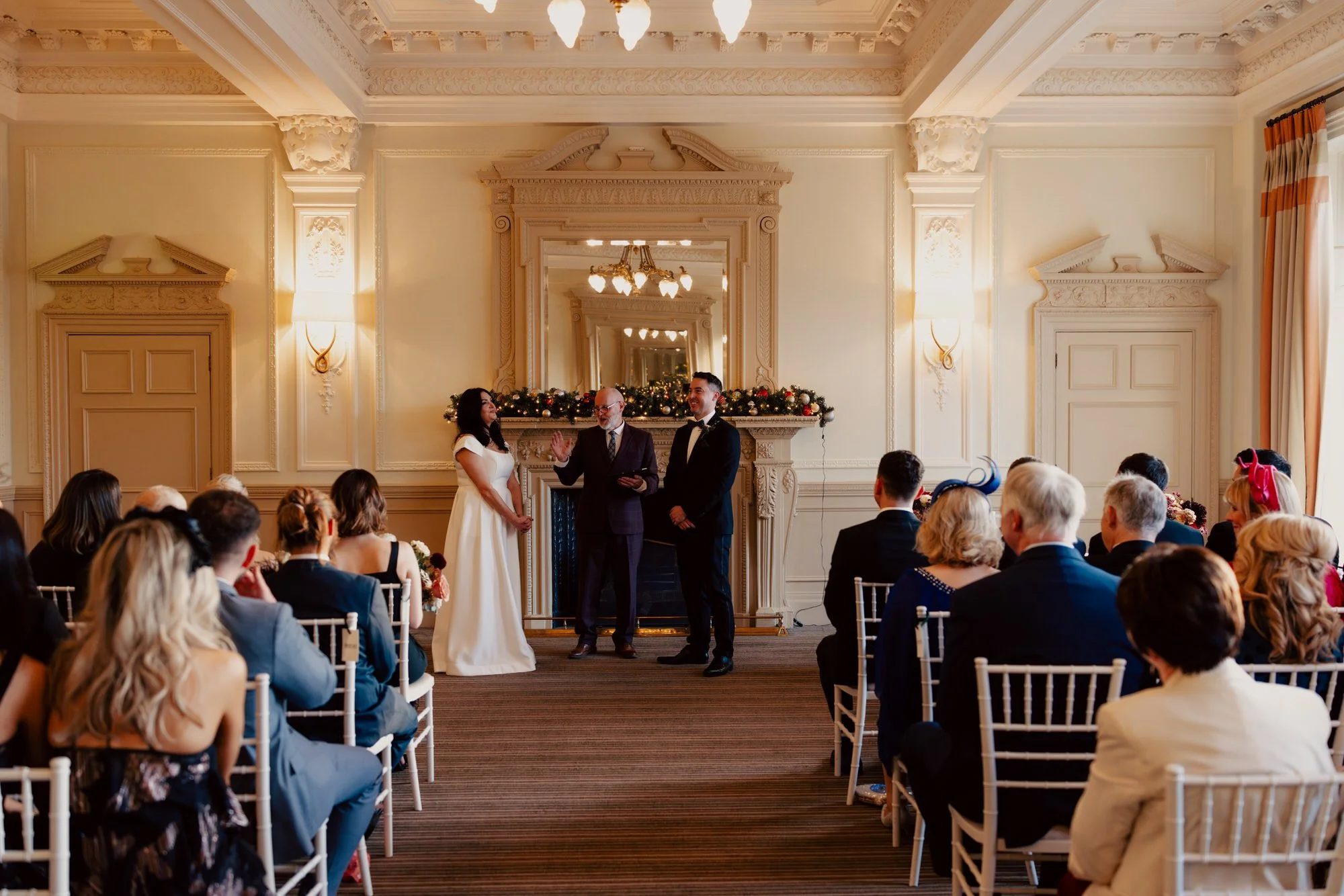 Wide view of the Balmoral wedding ceremony with guests seated.