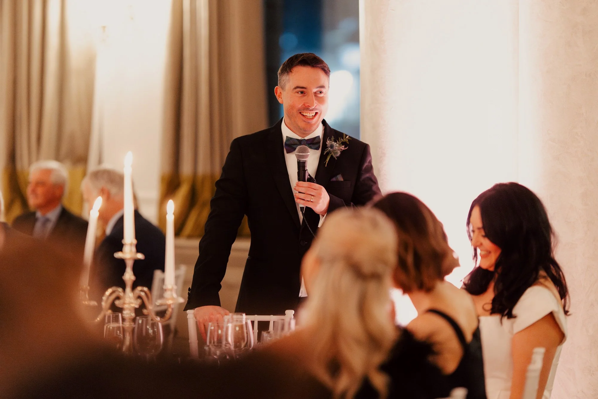 Vincent smiling while speaking at the wedding breakfast.
