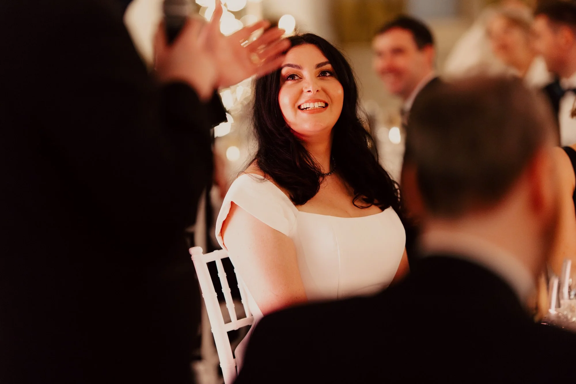 Milly smiling during the wedding speeches.