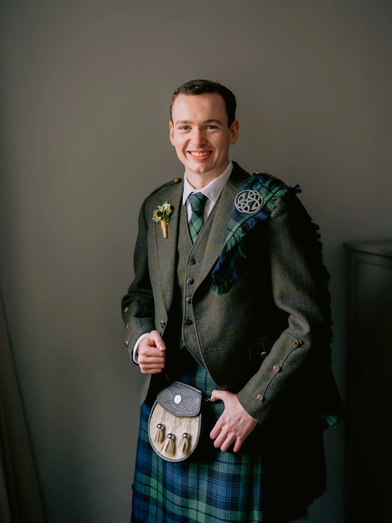 Fraser wearing his tartan kilt and jacket before the ceremony