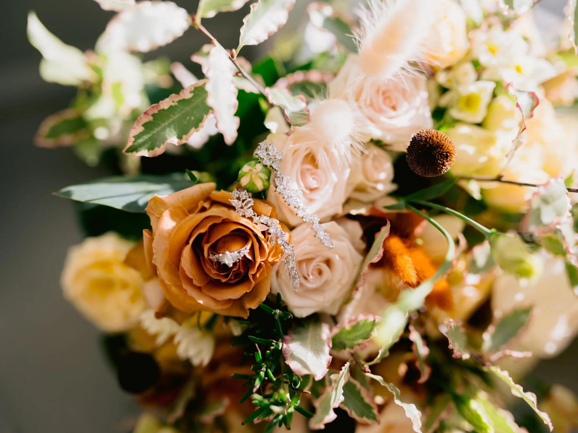 Peach and cream roses in Nicola’s bridal bouquet