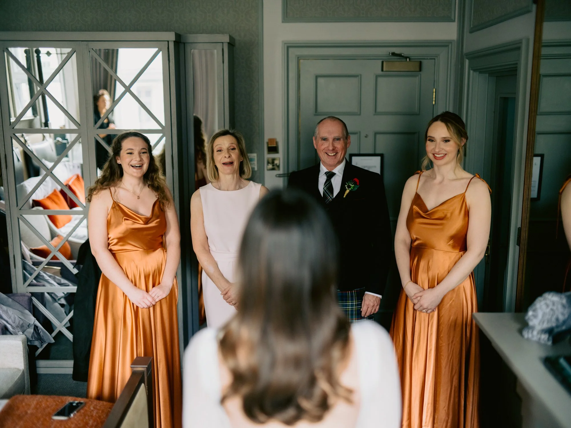 Nicola’s family reacting as she appears in her wedding dress