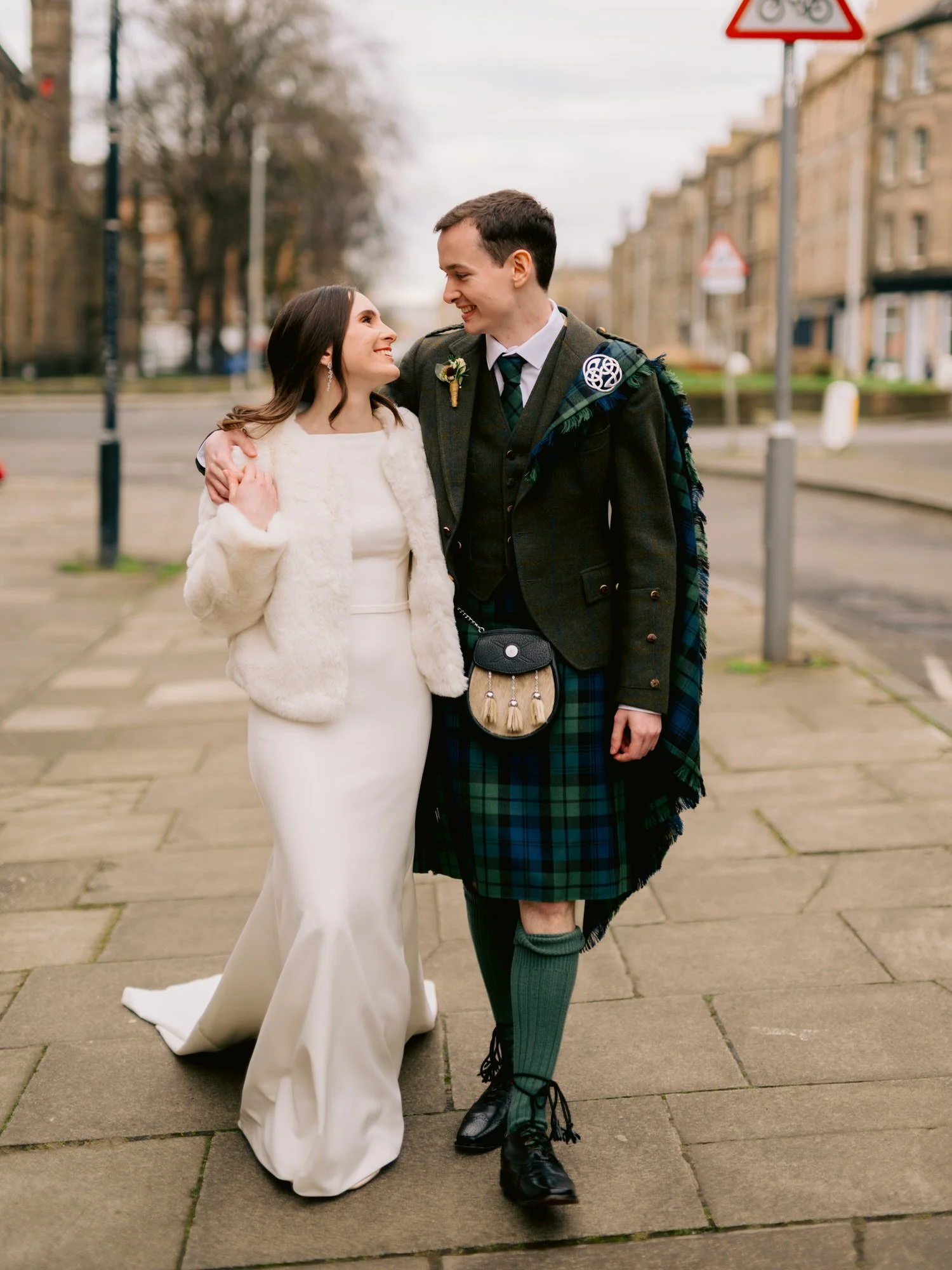 The couple looking at one another during their walk around Broughton
