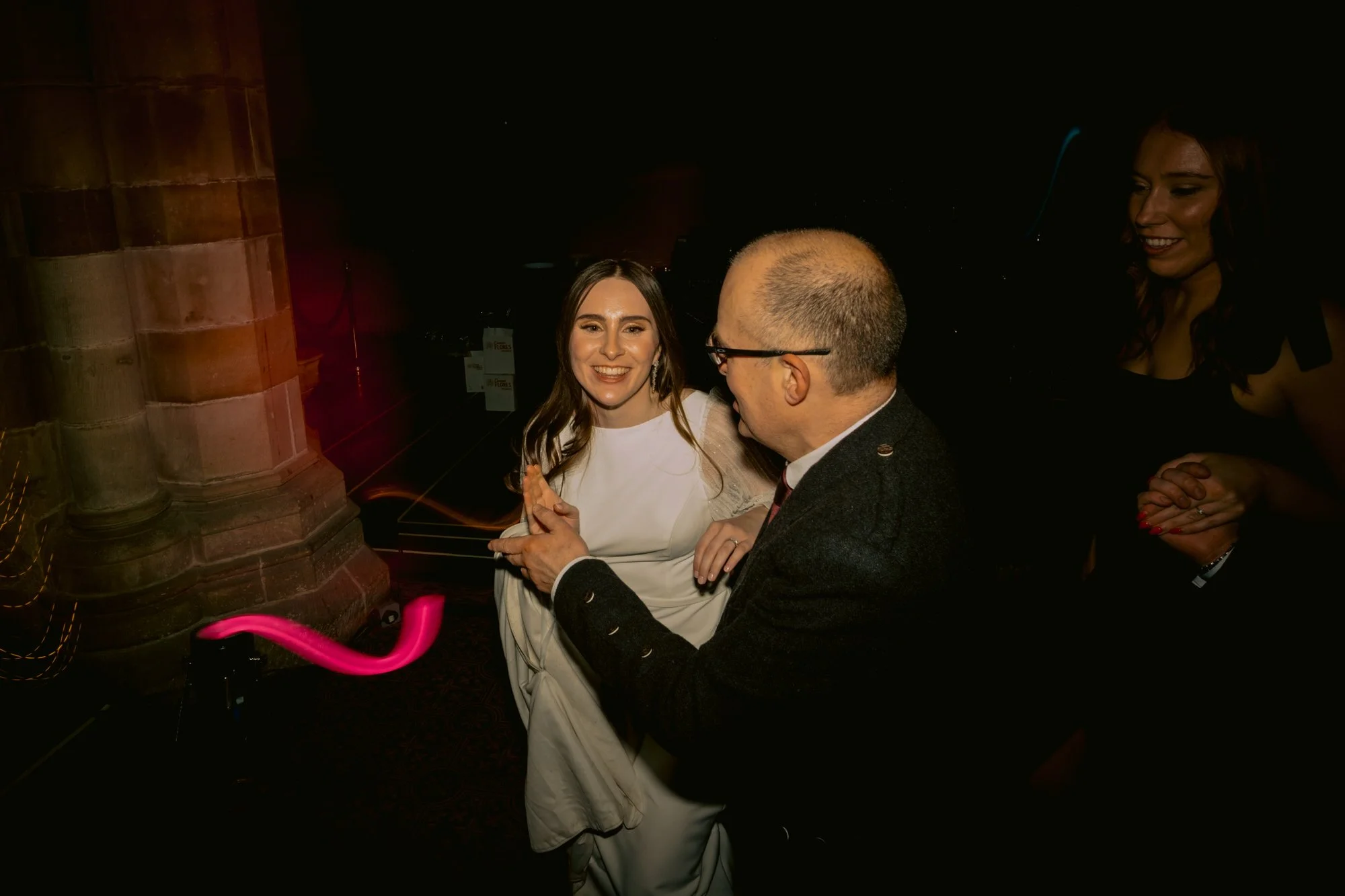 Nicola dancing with a guest during the evening reception
