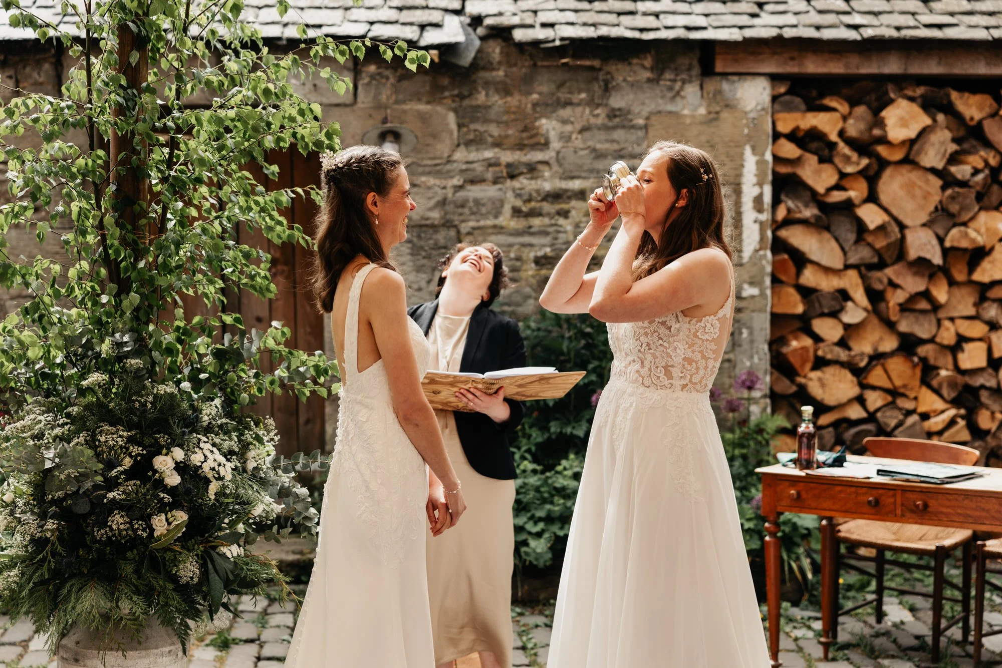 A bride drinking from the quaich during the ceremony