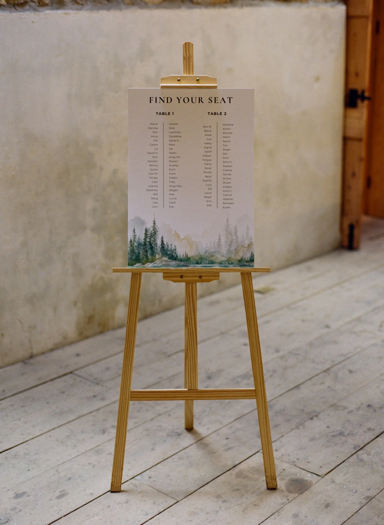 The wedding seating plan displayed on an easel