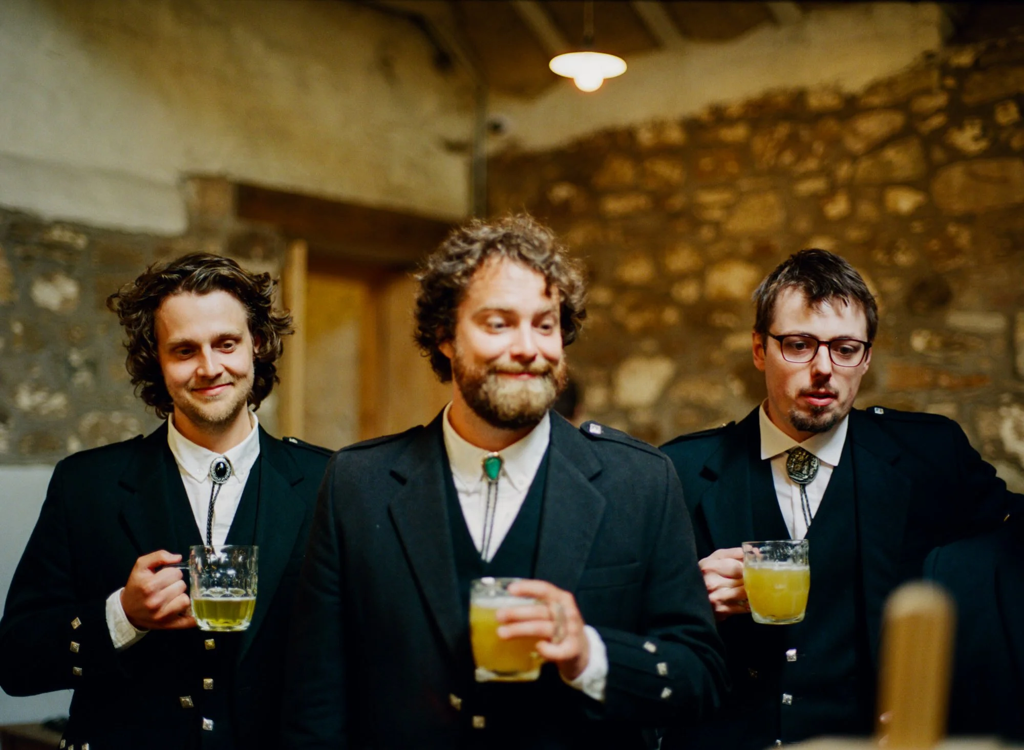 Wedding guests talking over drinks