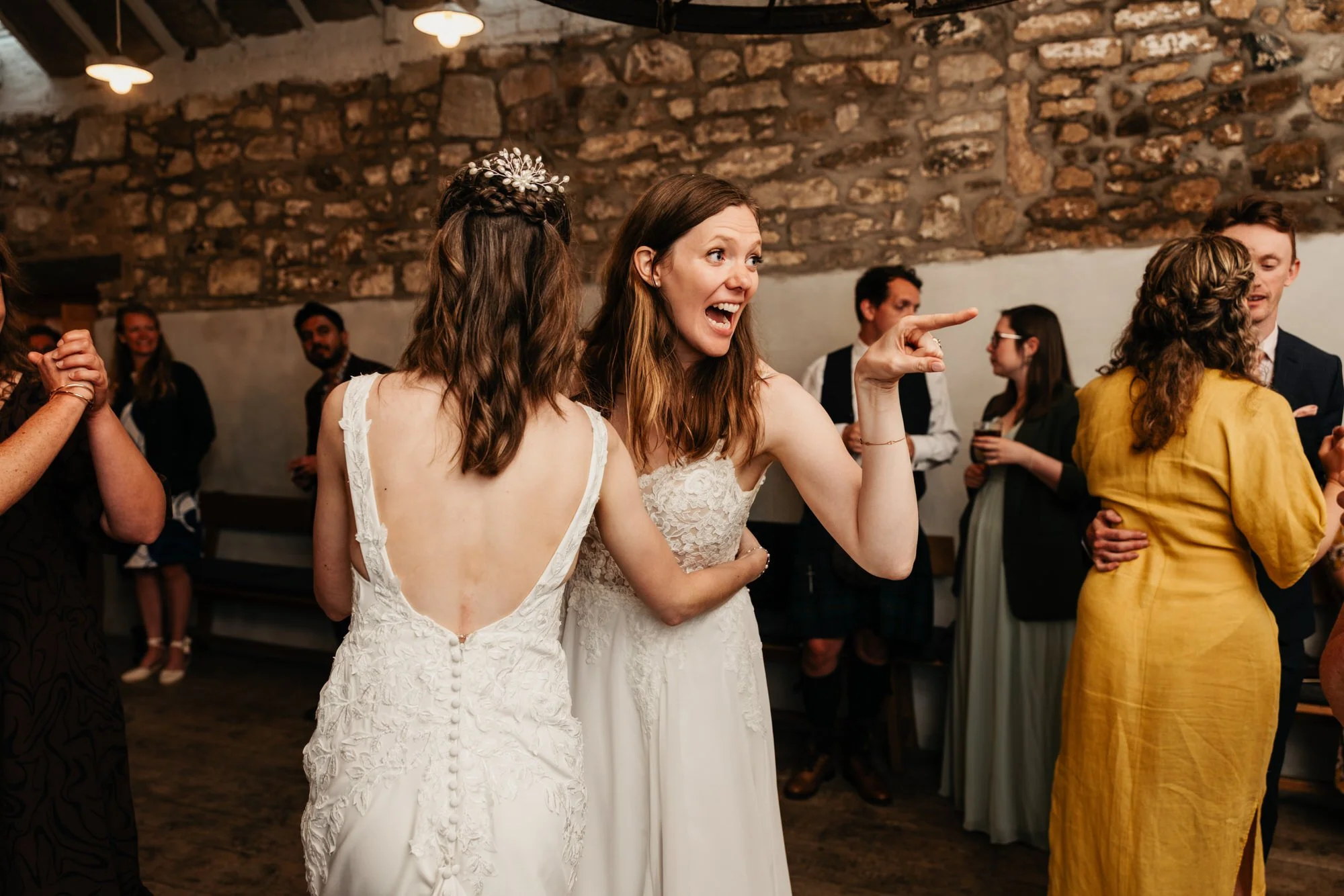 Jackie and Briony laughing on the dance floor