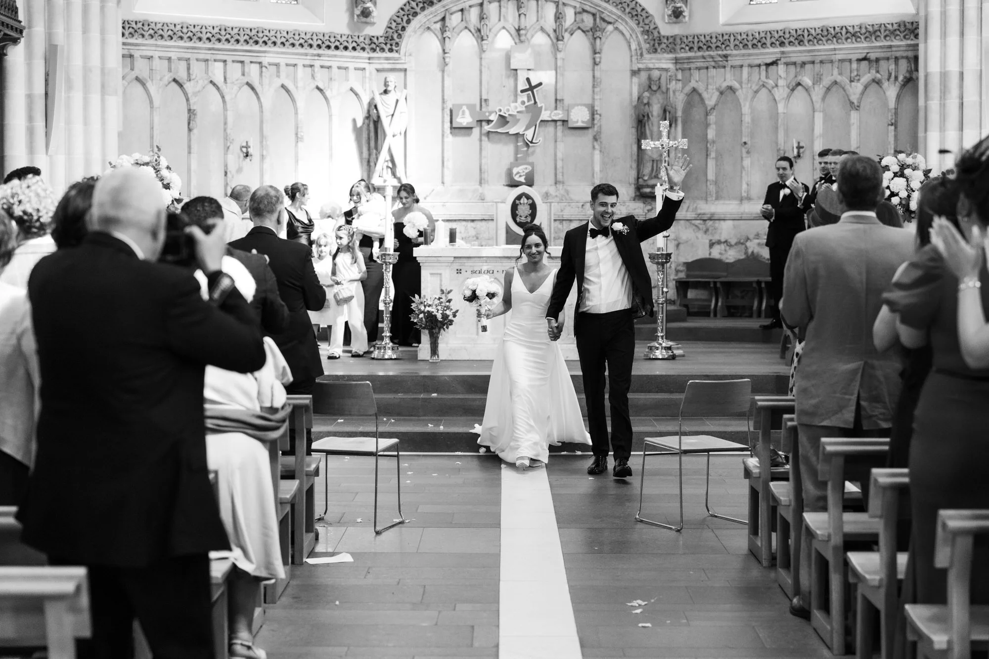 Caterina and Jonathan walking back down the cathedral aisle