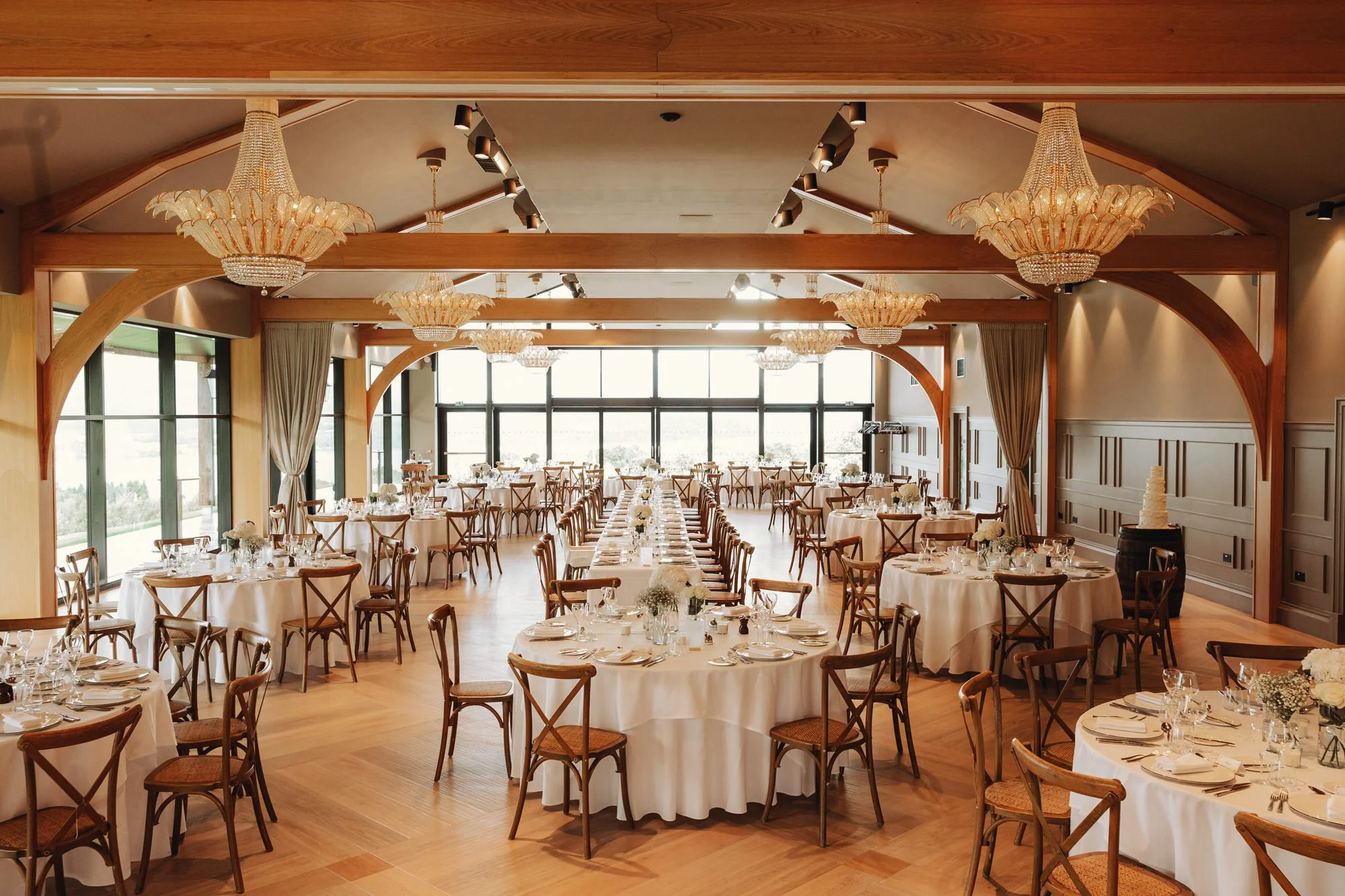 The wedding reception tables inside Boturich’s pavilion