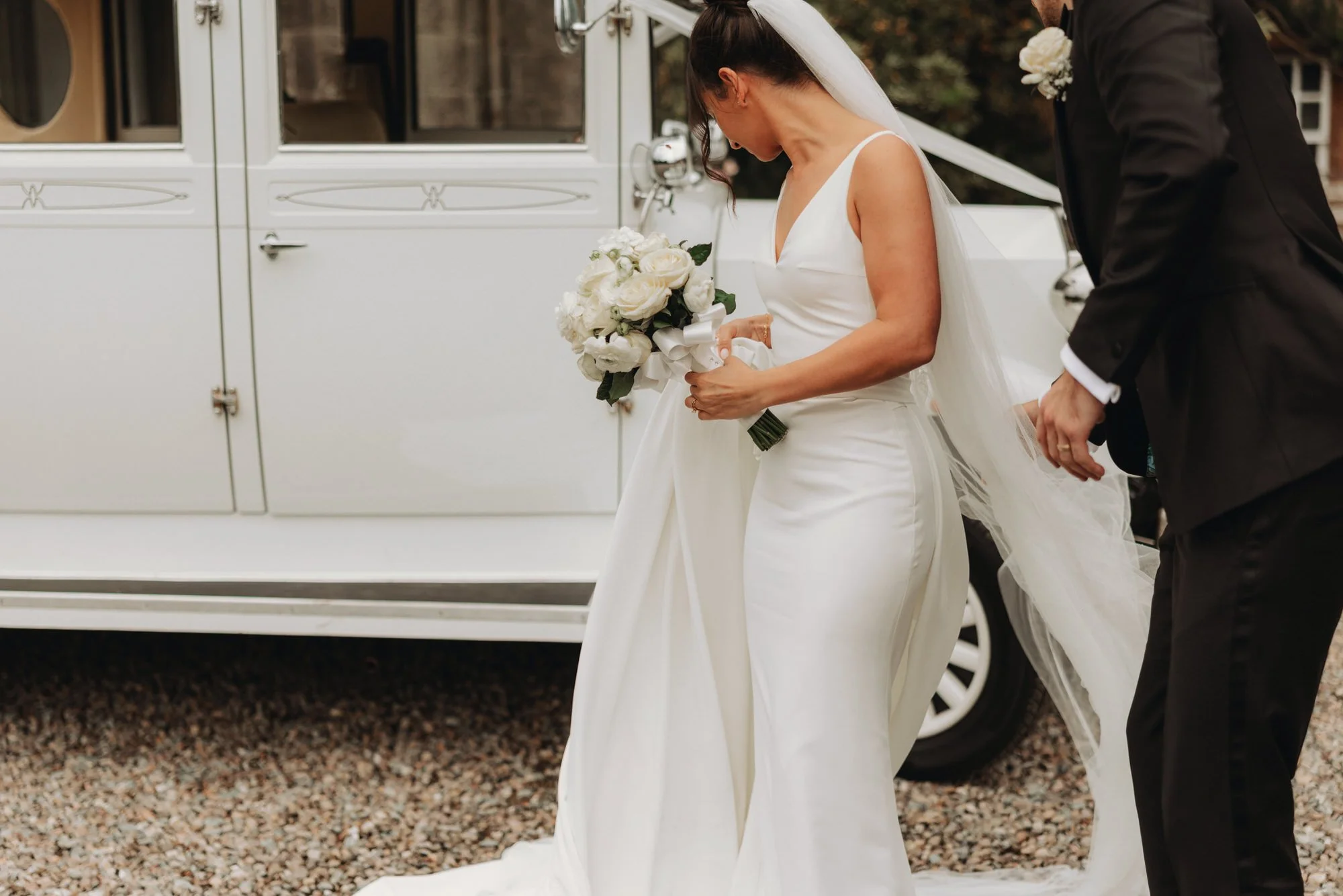 Caterina stepping out of the wedding car at Boturich