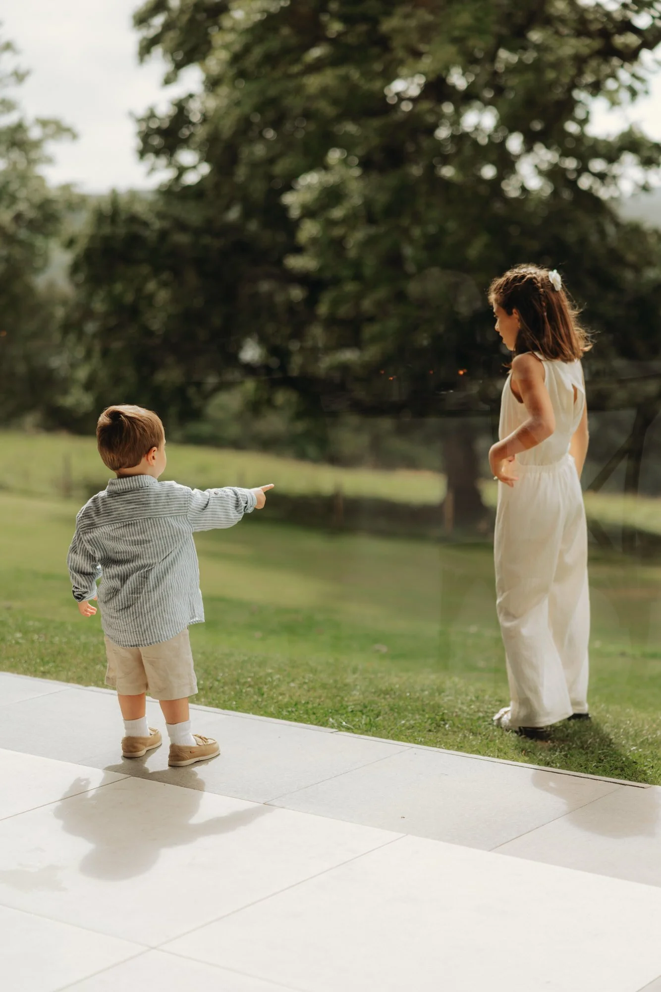 Caterina with a young guest on the terrace
