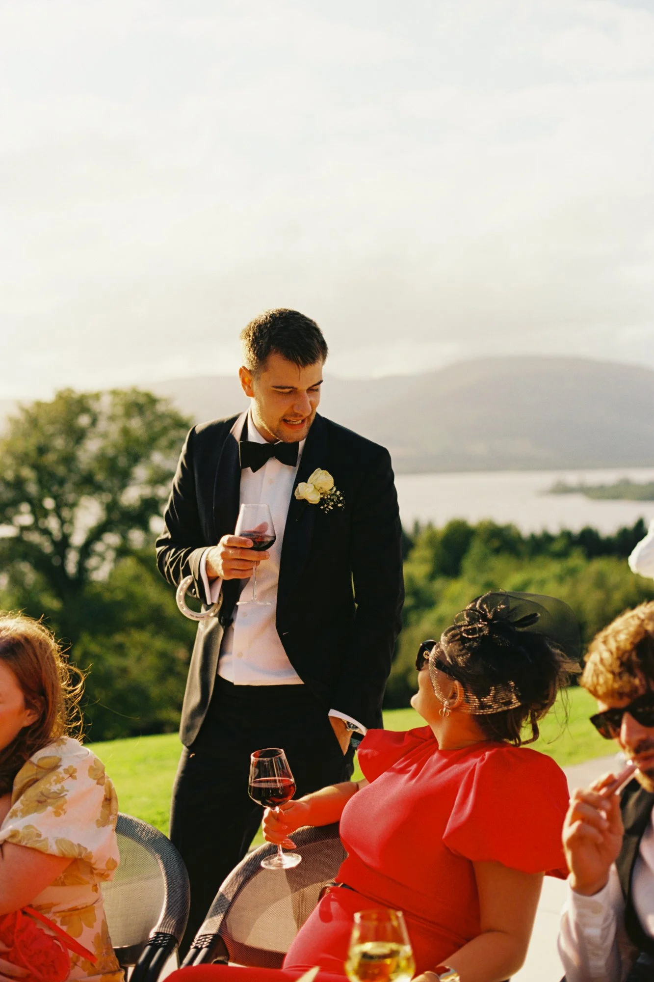 Jonathan speaking to guests seated outside