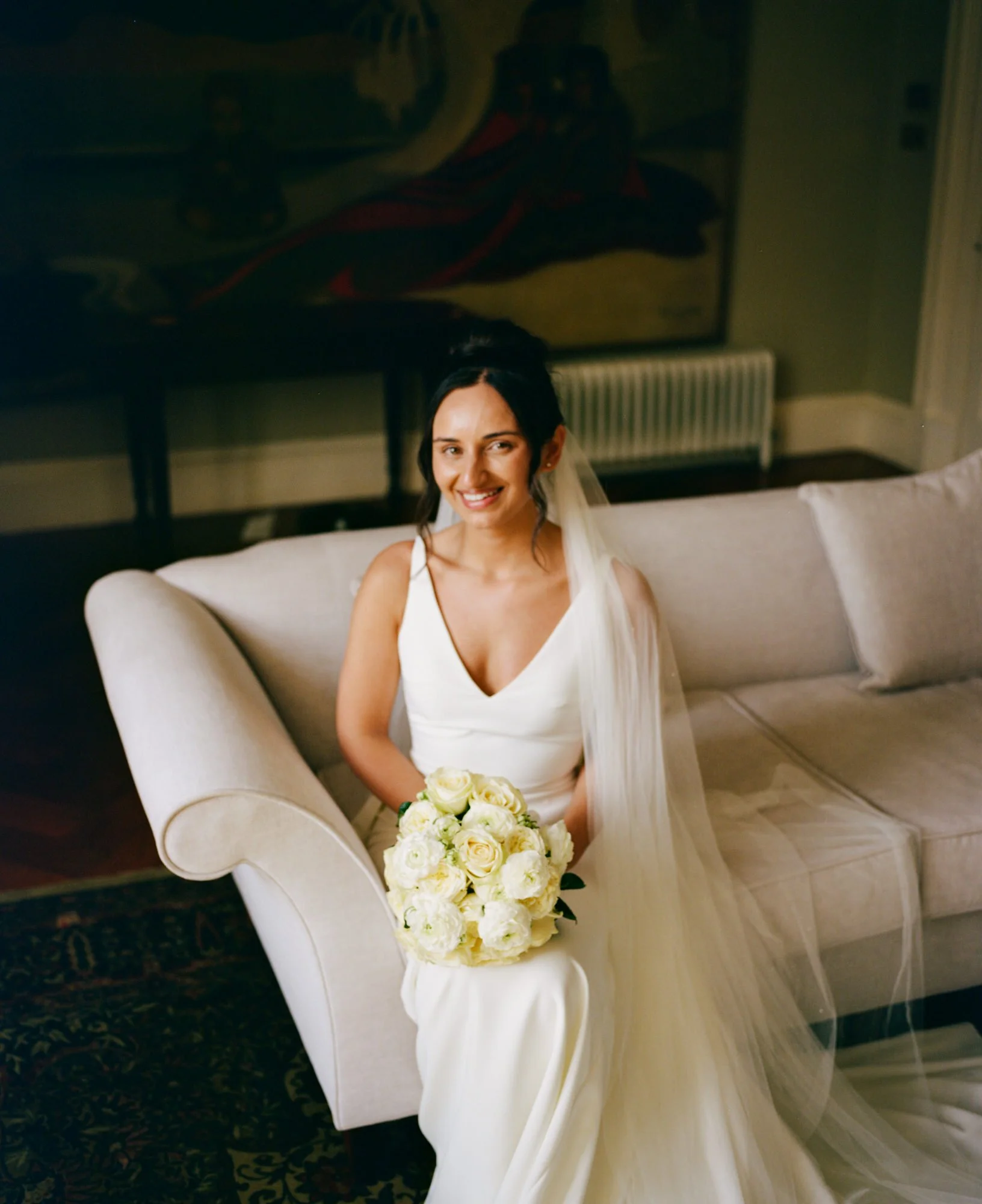 Caterina seated on a sofa inside Boturich Castle