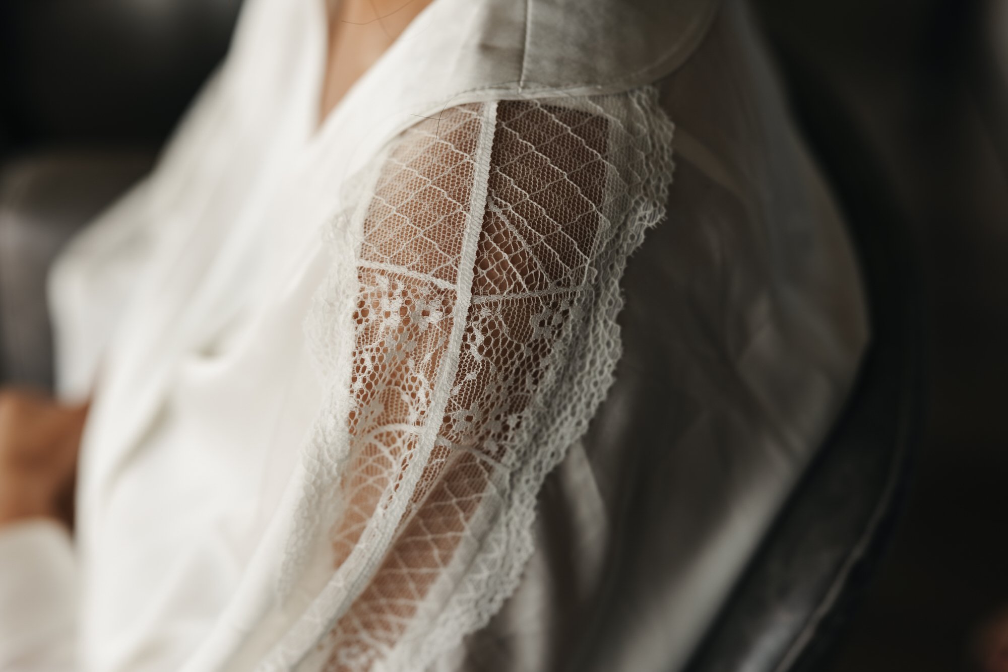 Close detail of a lace veil in soft window light