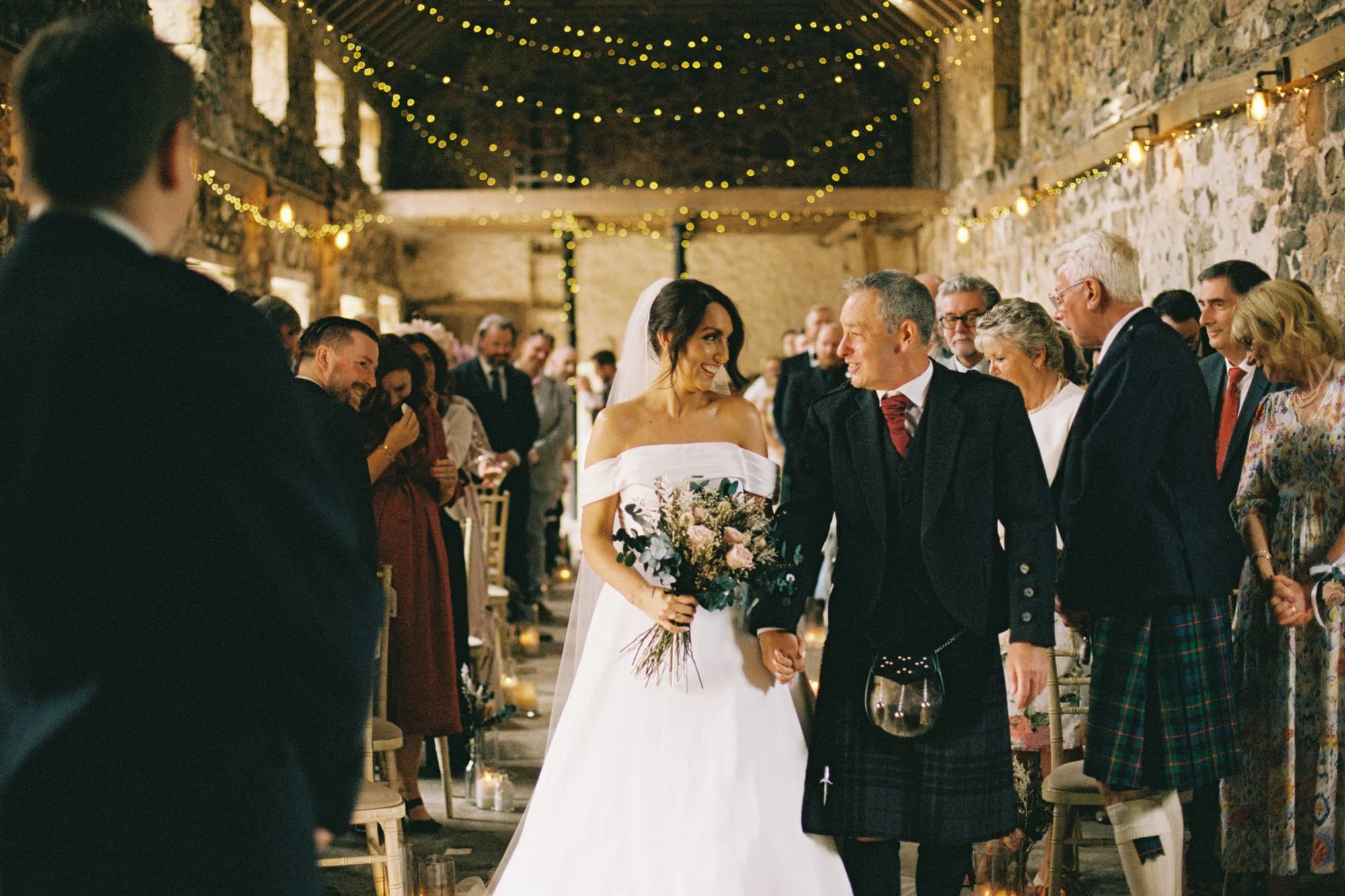 Claire walking into the ceremony at Pratis Barns