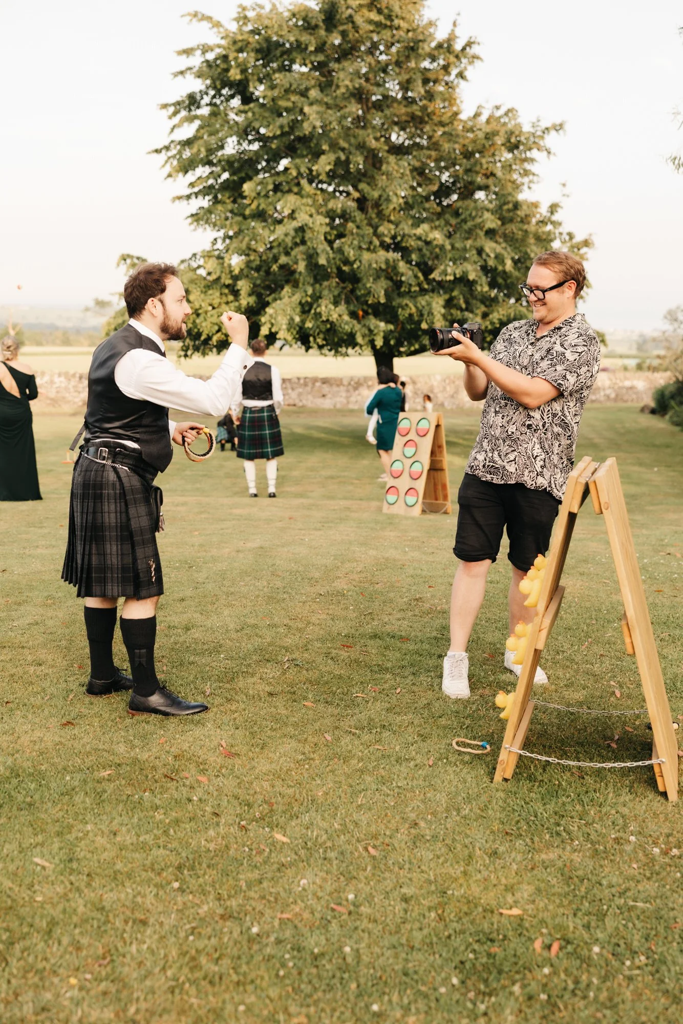 Wedding guests playing a lawn game at Pratis Barns