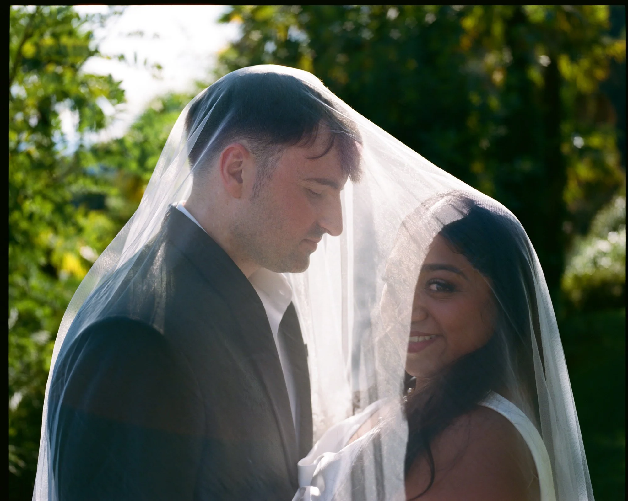 Velia and Dan together under the veil