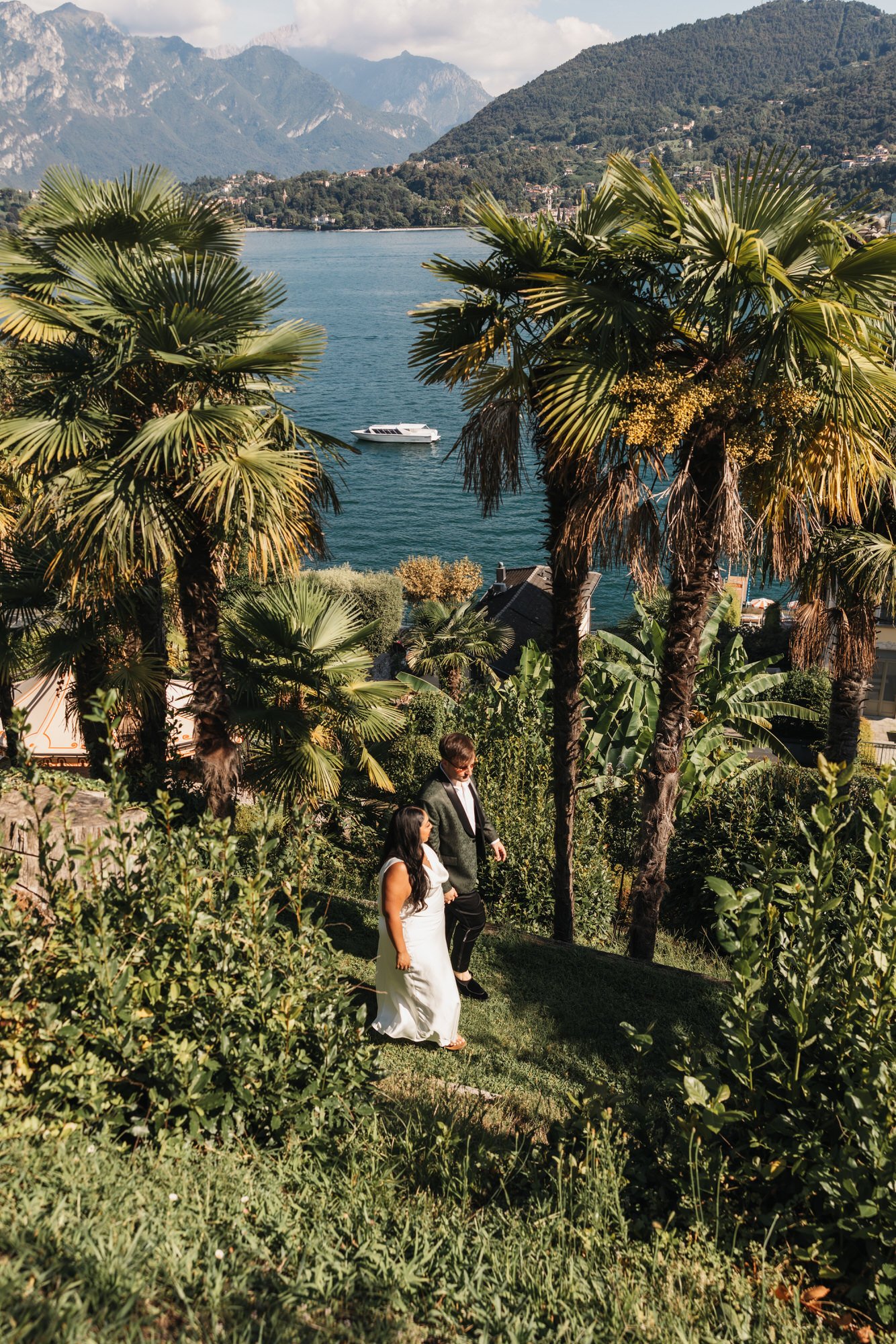 Velia on a garden path with the lake beyond