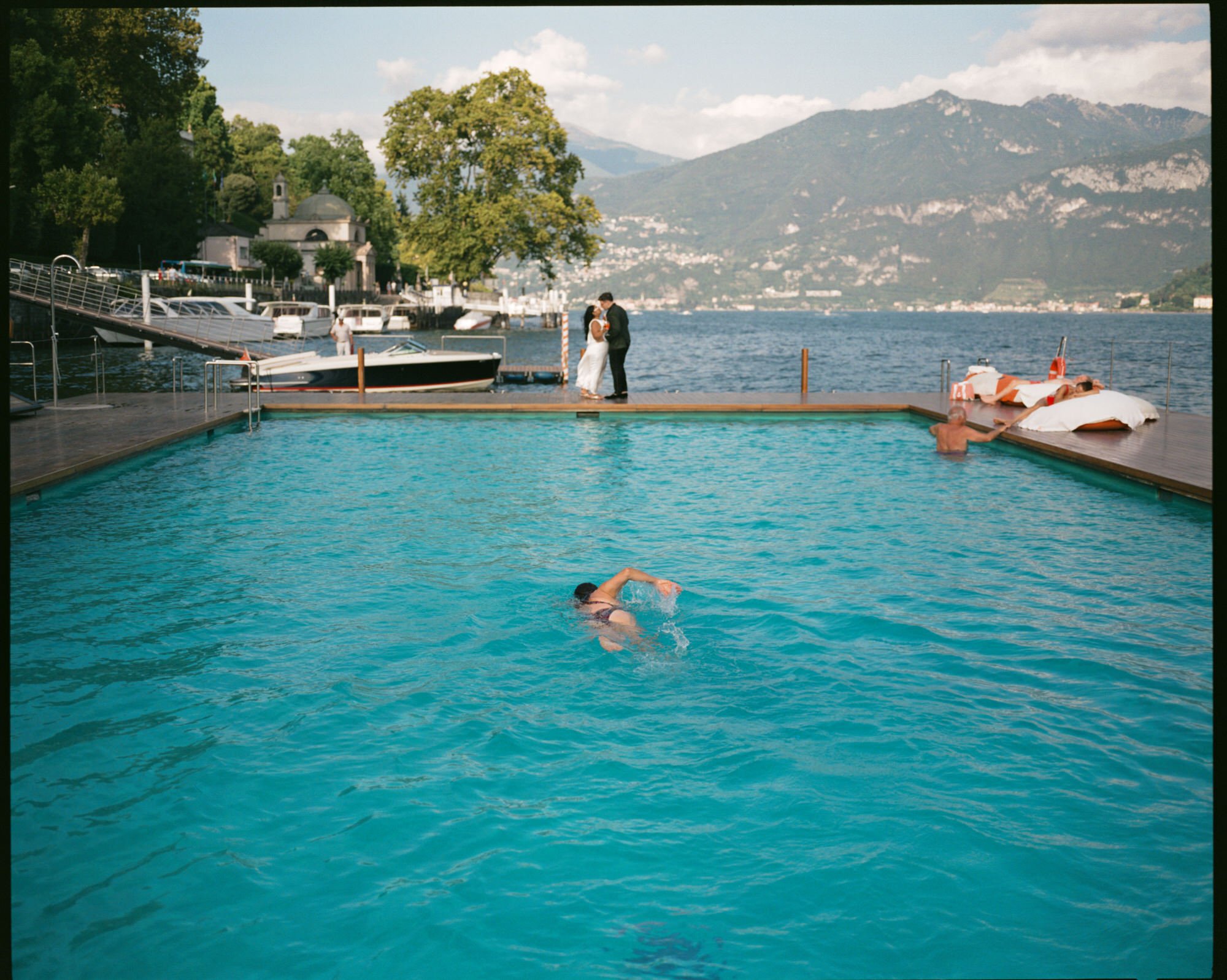 The floating swimming pool with Lake Como beyond