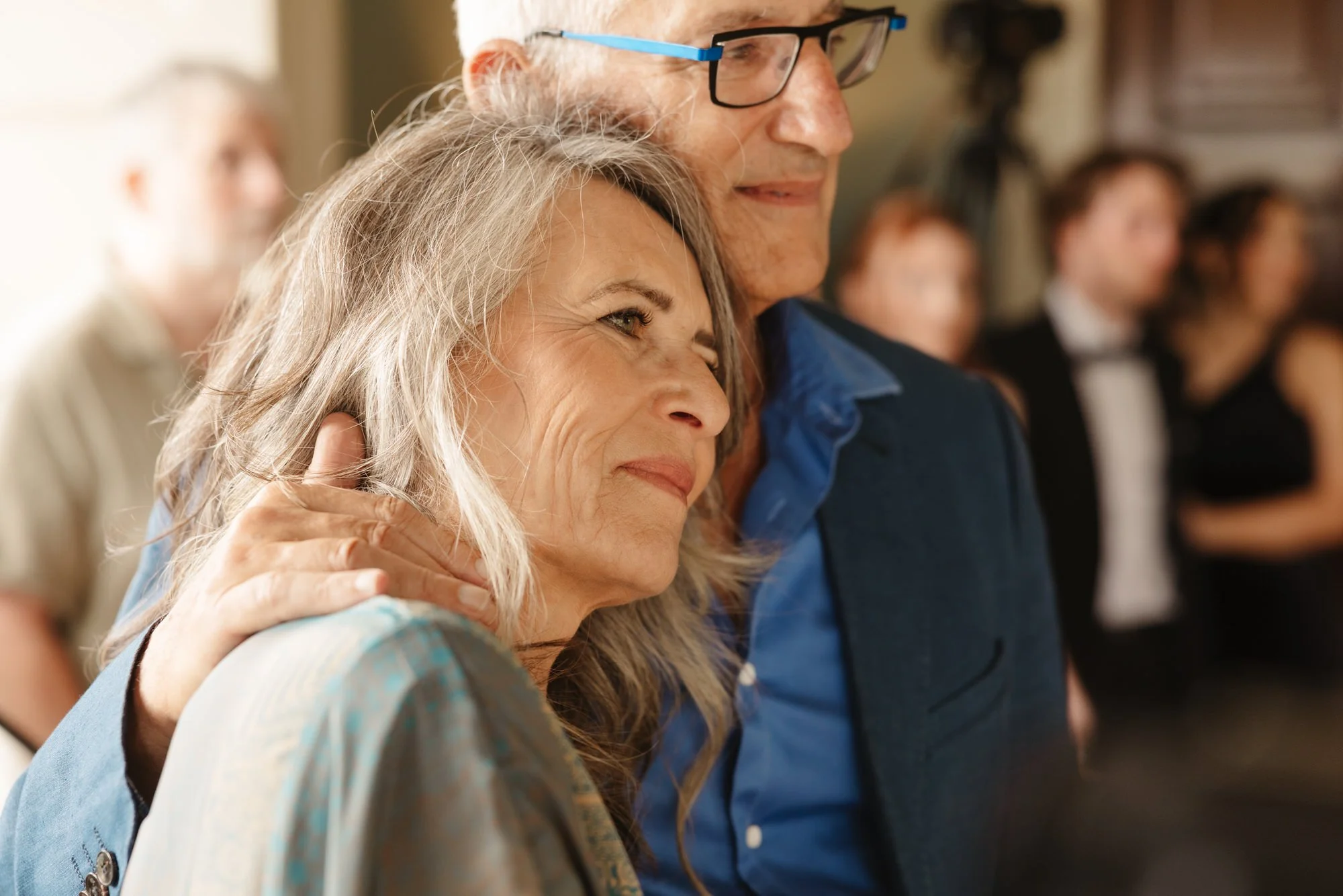 A man and woman at a formal event, with the woman leaning her head on the man's chest. Photographed by Steven William Weir, Edinburgh Scotland.