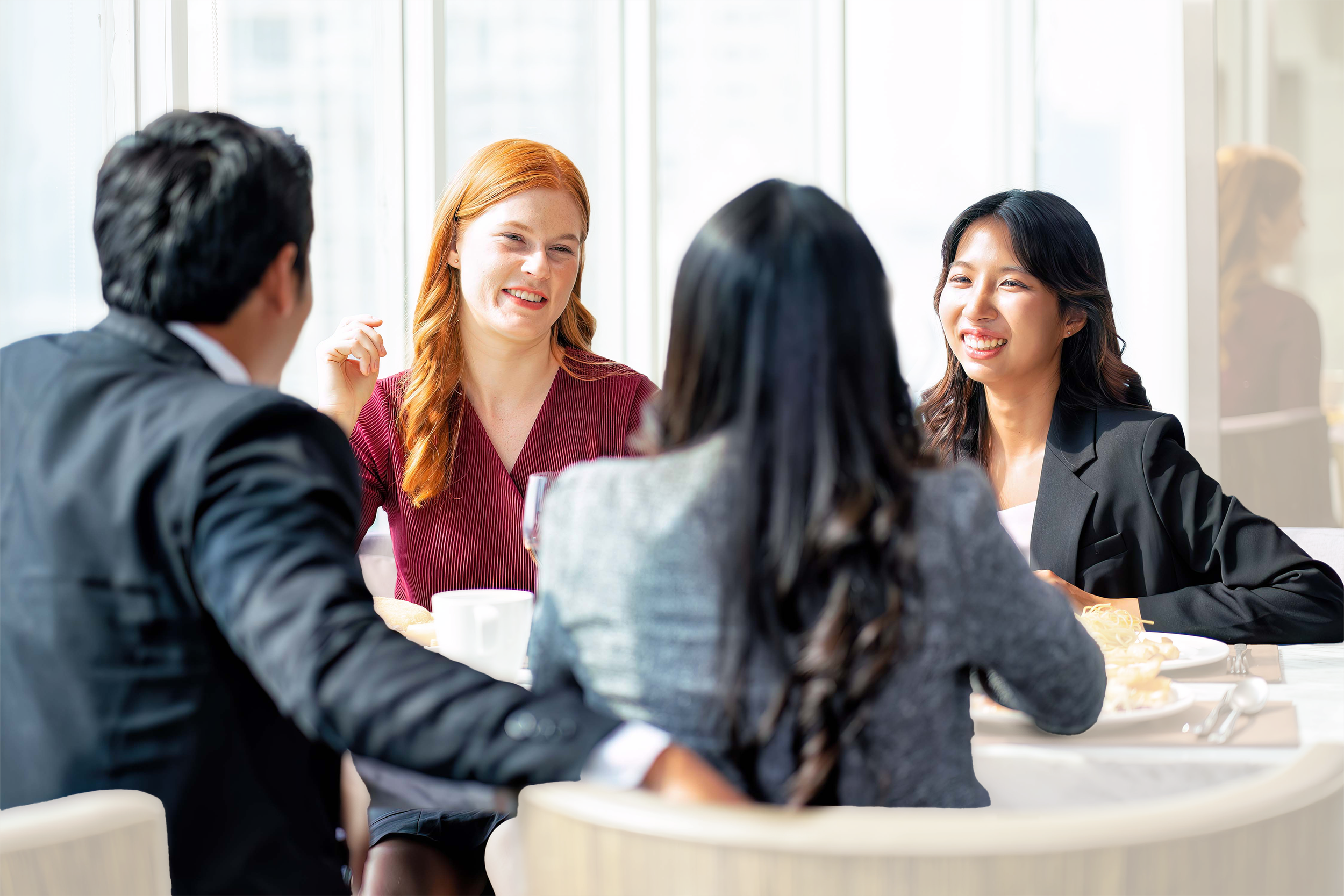 Group of bussiness professional sittting at a table